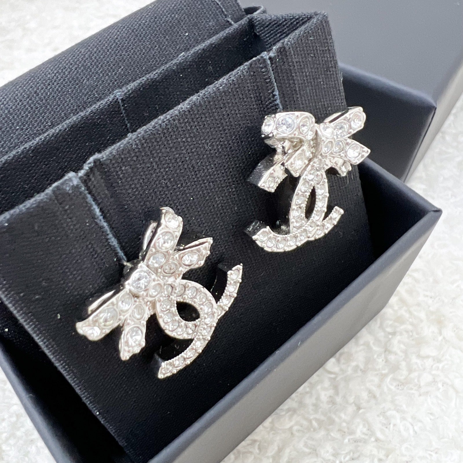 Chanel 23S Ribbon Earrings with Crystals in Shw