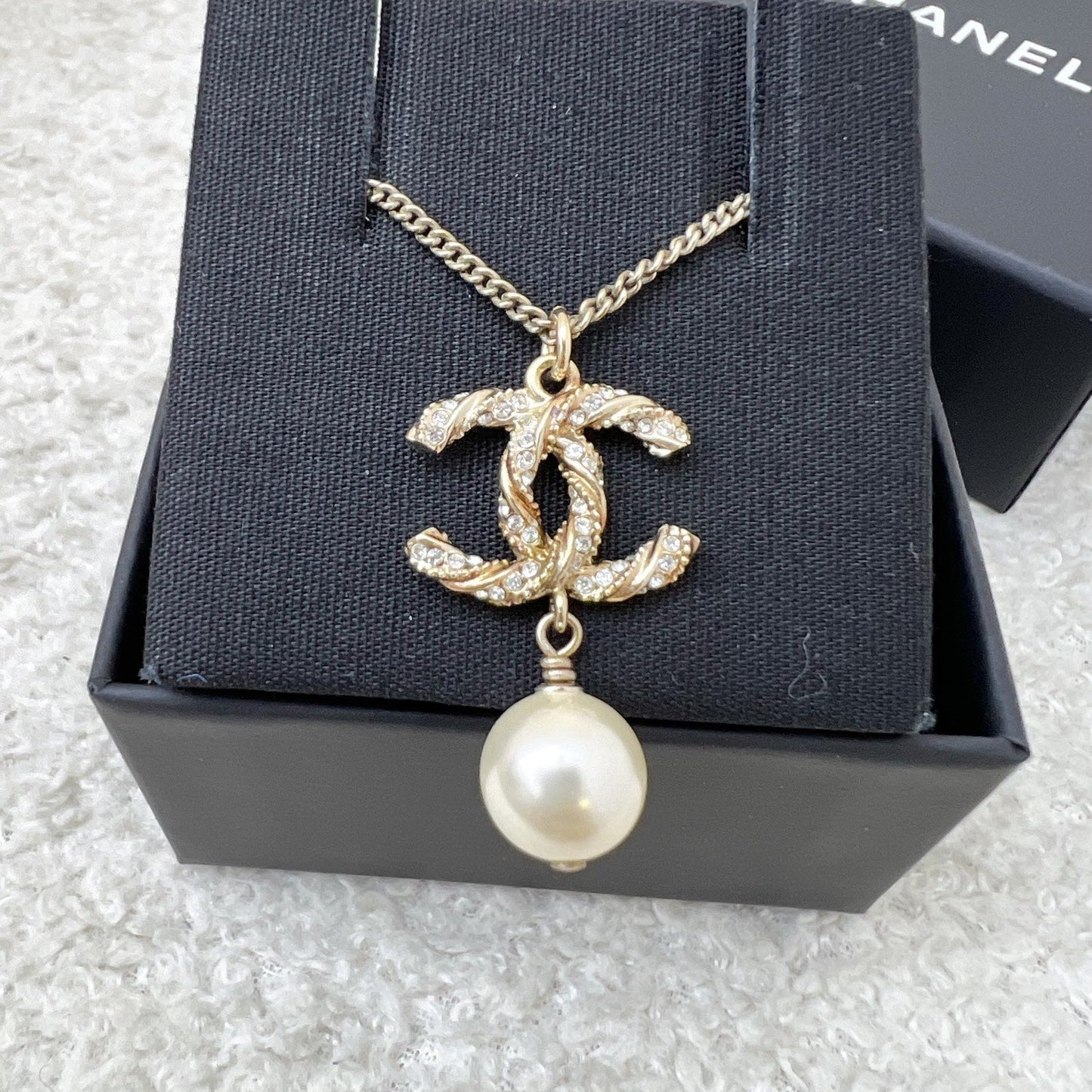 Chanel CC Logo with Dangling Pearl Necklace in Aged Gold Hw