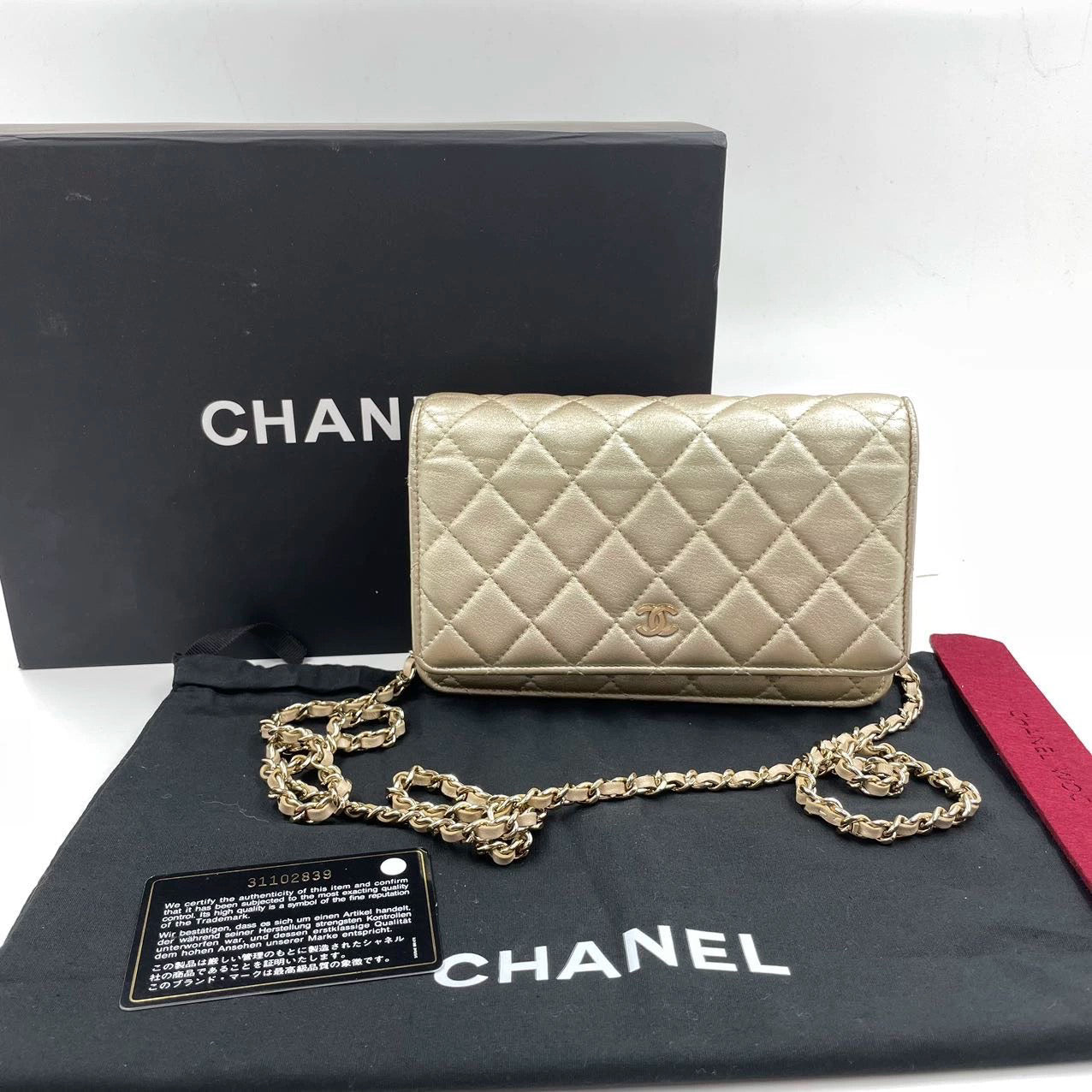 Chanel on WOC Lambskin Gold Leather Wallet Case