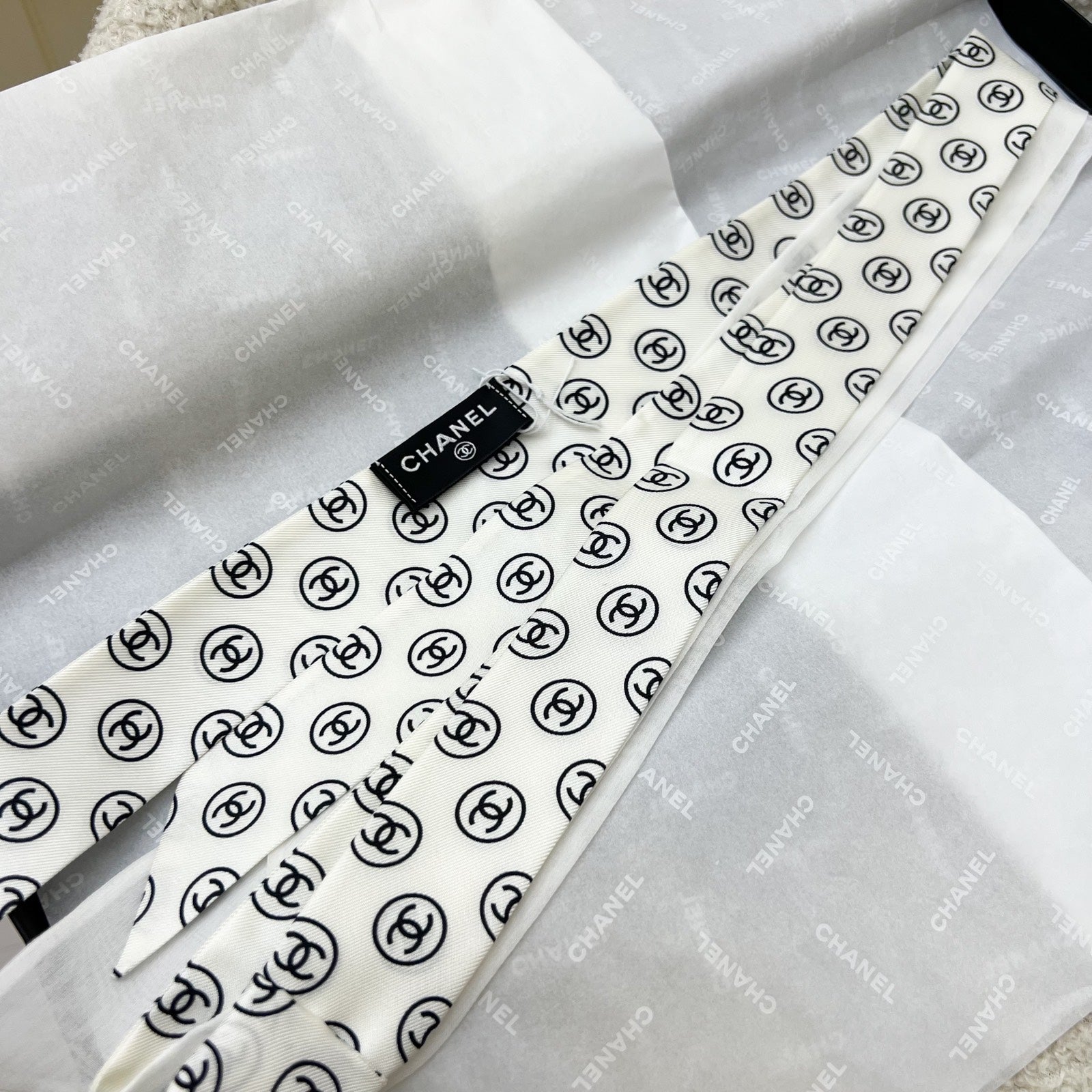 Chanel 25K Slim Bandeau with Black Logo in White Silk Handbag