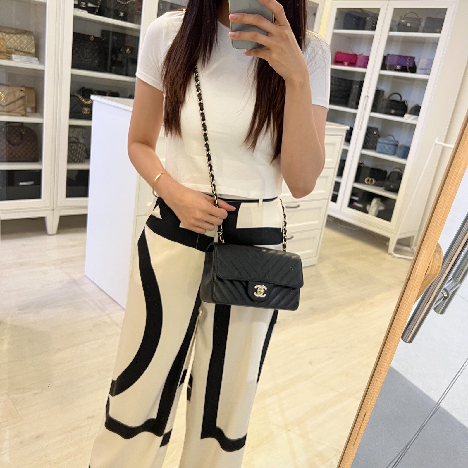 Chanel Classic Mini Rectangle Flap In Chevron Quilted Black Caviar And Lghw Bag