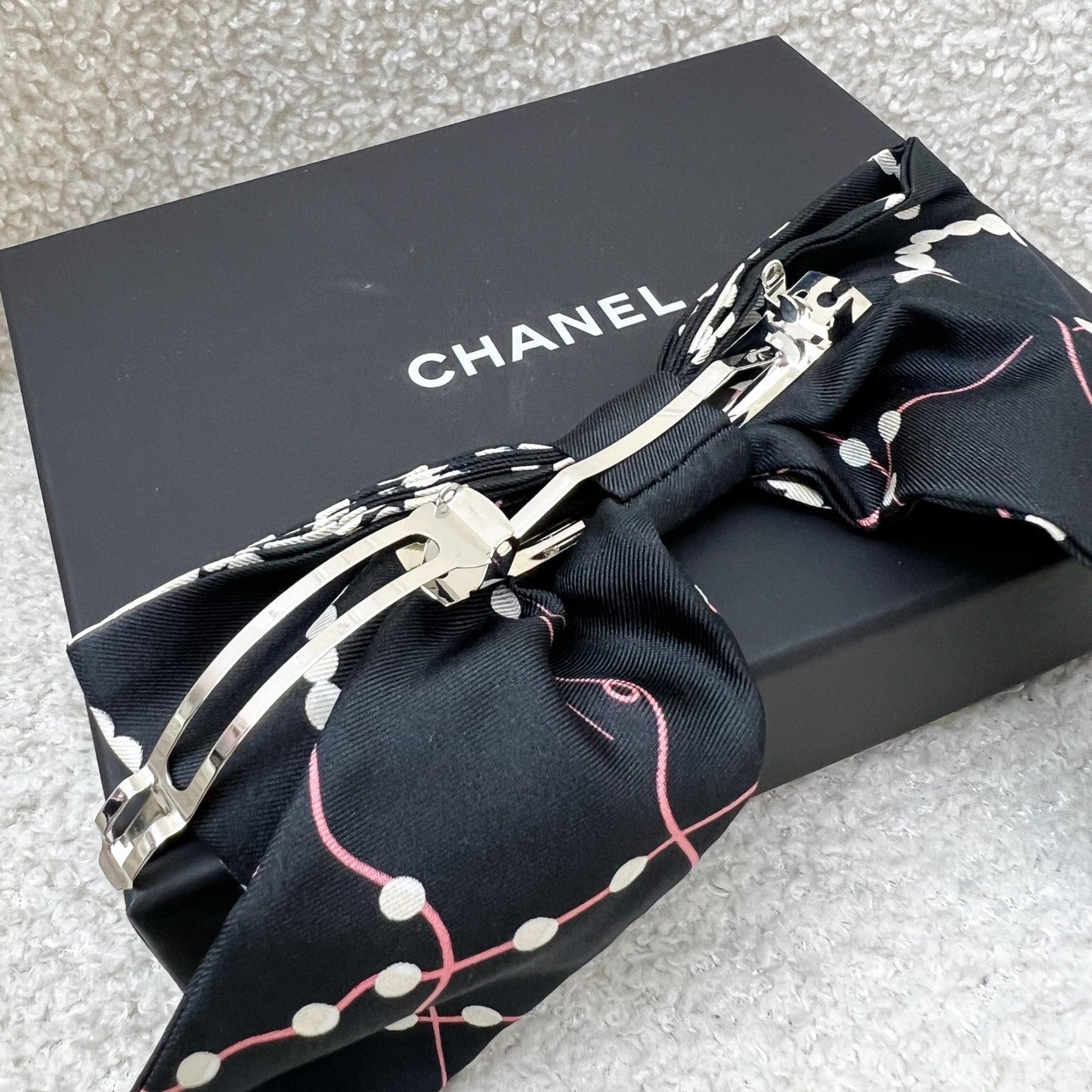 Chanel 23K Printed Pearl Motifs Bow Hair Clip In Black And Off White Fabric With Silver French Barrette Bag