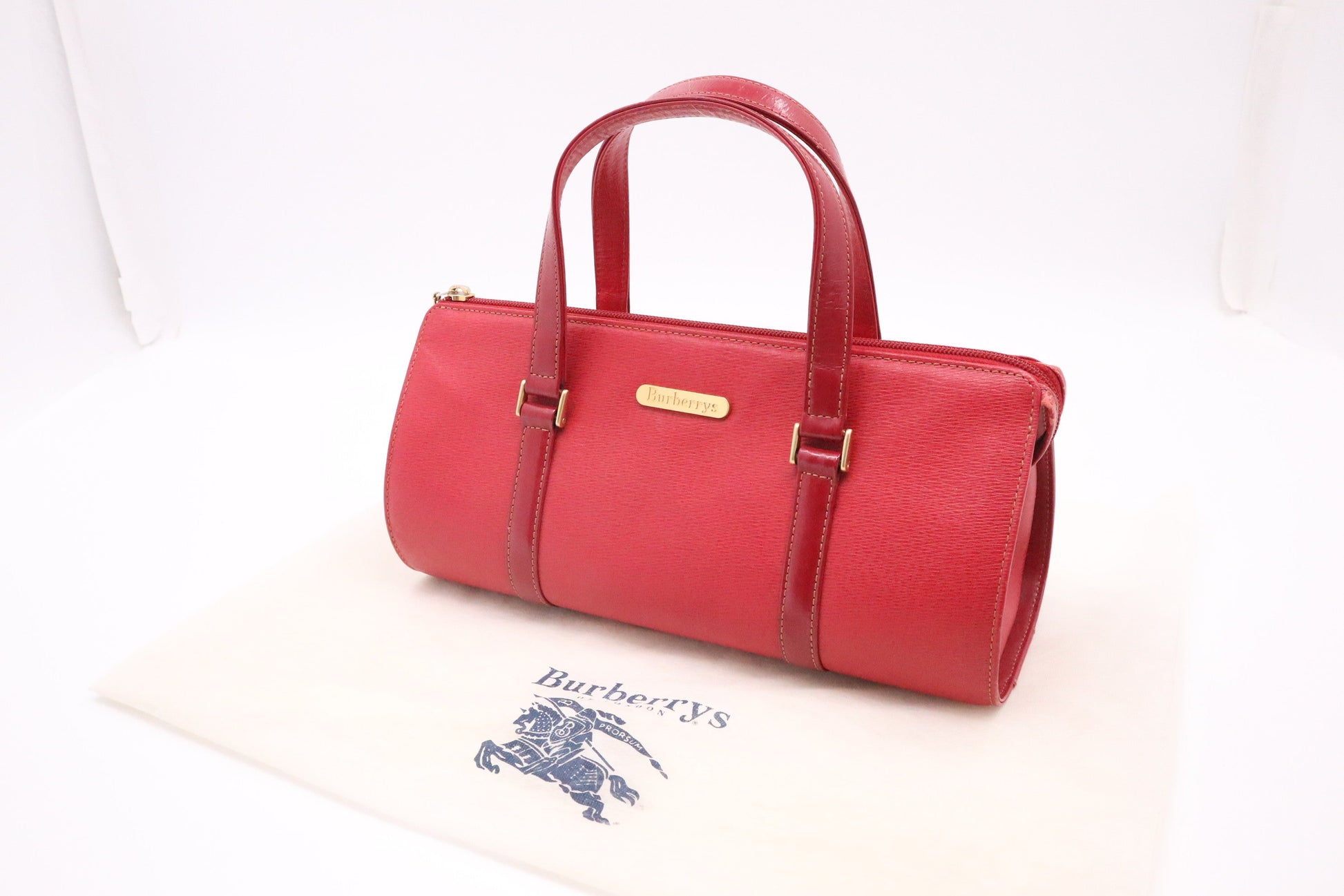 Burberry Round Handbag In Leather Red Travel Bag
