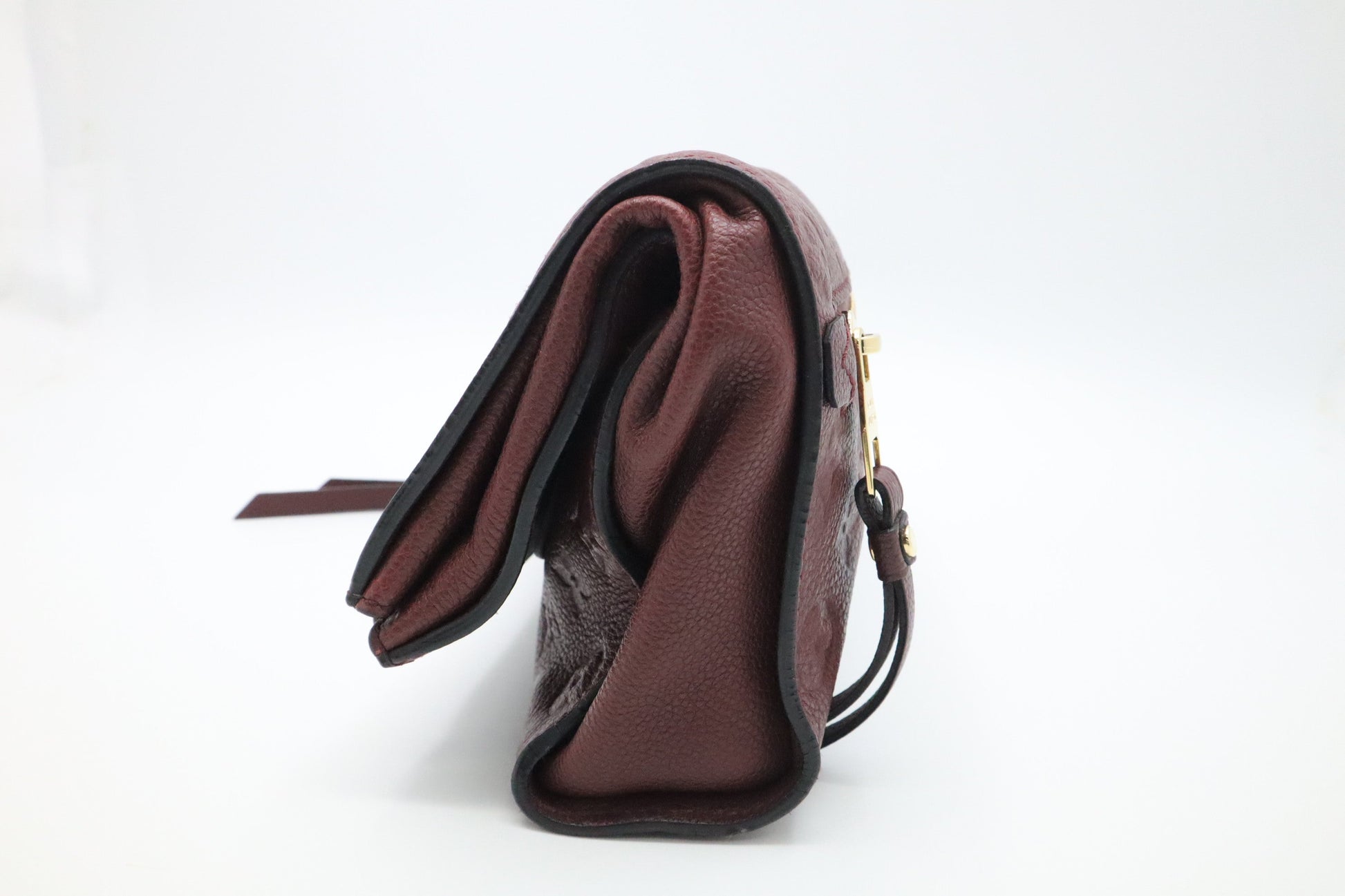 Louis Vuitton Petillante Flamme Empreinte Leather Clutch Bag