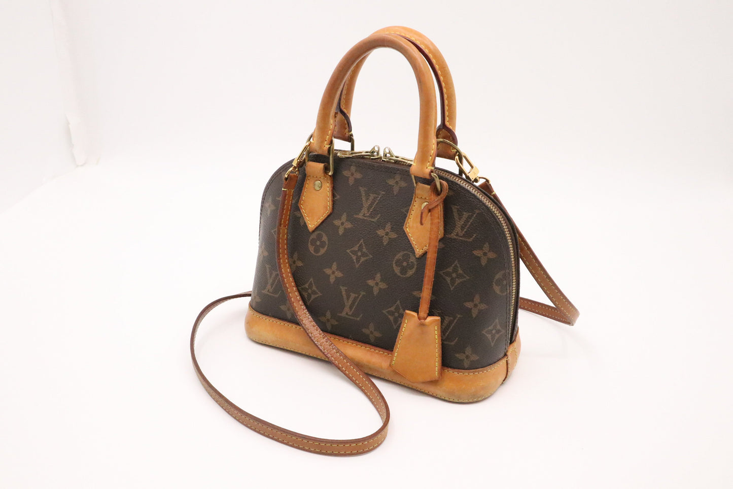 Louis Vuitton Alma BB Monogram Canvas Handbag Monogram Canvas
