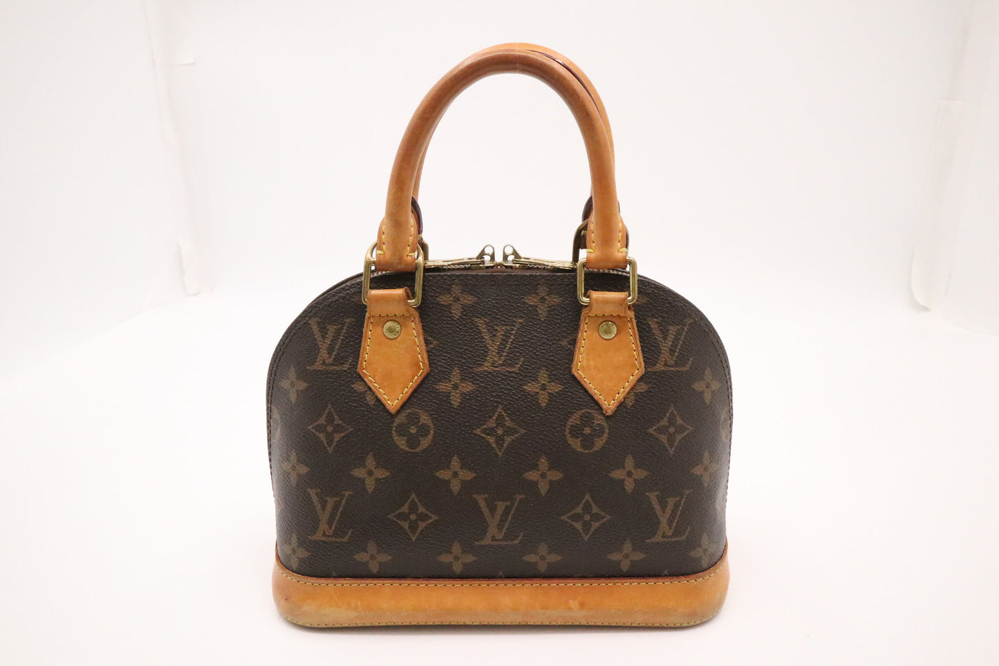 Louis Vuitton Alma BB Monogram Canvas Handbag Monogram Canvas