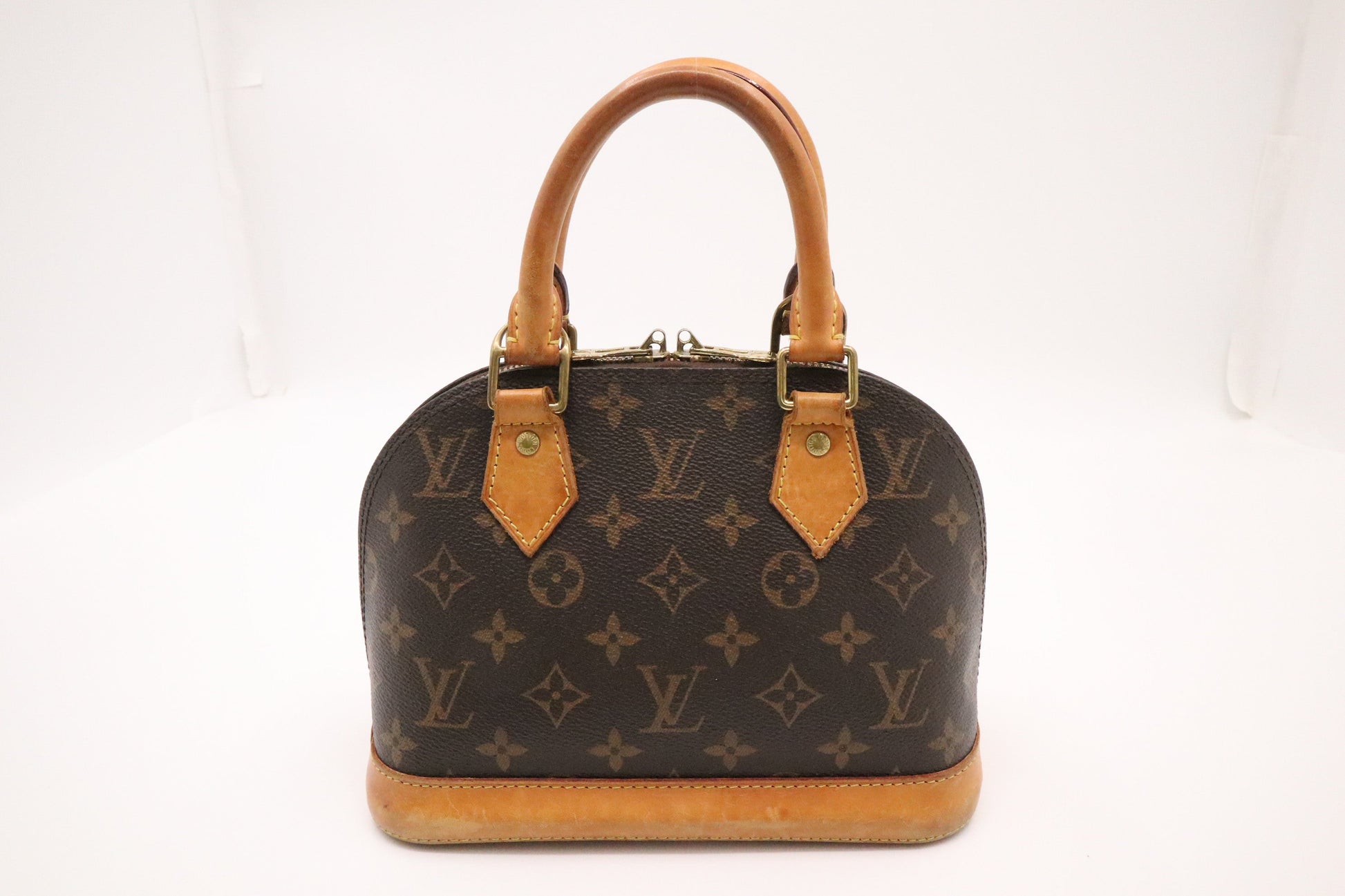 Louis Vuitton Alma BB Monogram Canvas Handbag Monogram Canvas