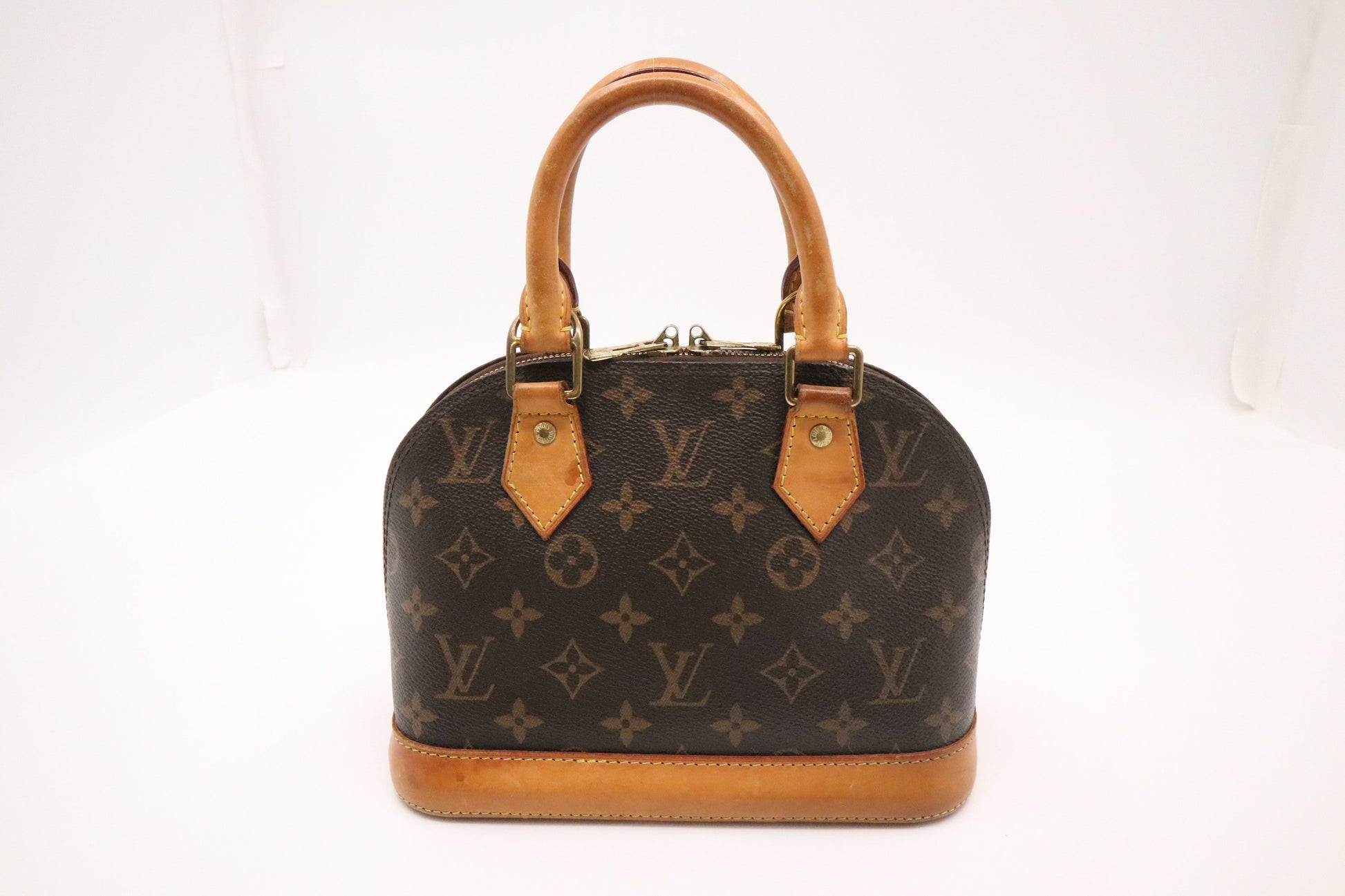 Louis Vuitton Alma BB Monogram Canvas Handbag Monogram Canvas