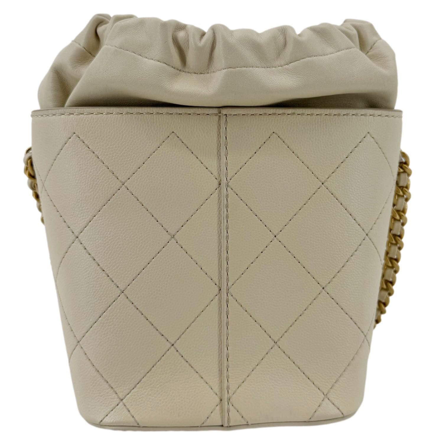 Chanel CC Drawstring Quilted Bucket Cream Leather Jewelry