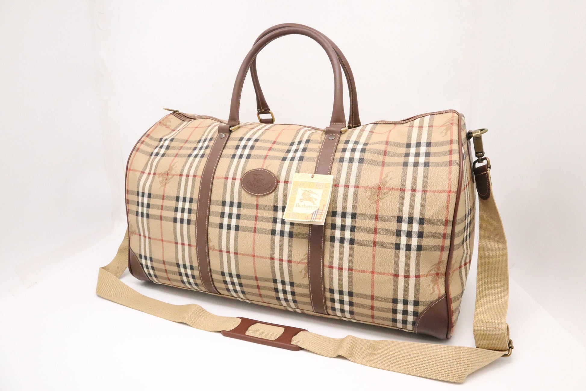 Burberry Travel Bag In Coated Check Canvas Beige