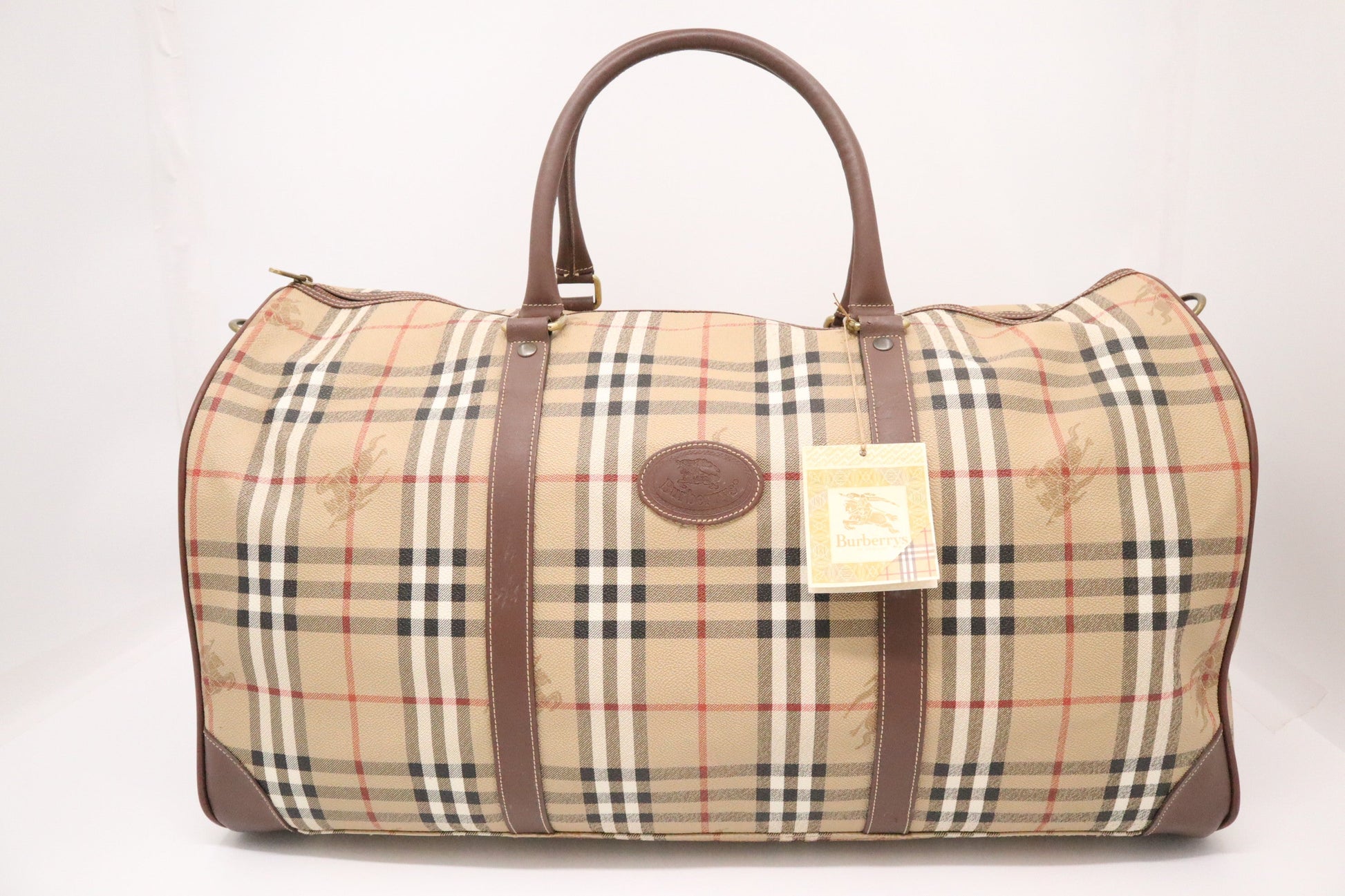 Burberry Travel Bag In Coated Check Canvas Beige