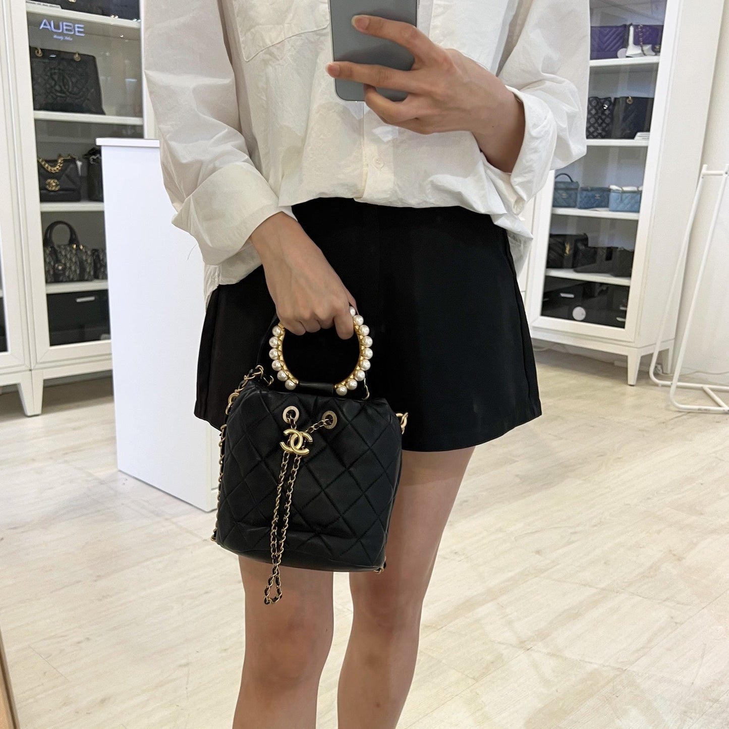 Chanel Pearl Handle Mini Drawstring Bucket Bag in Black Lambskin and Aghw ( )