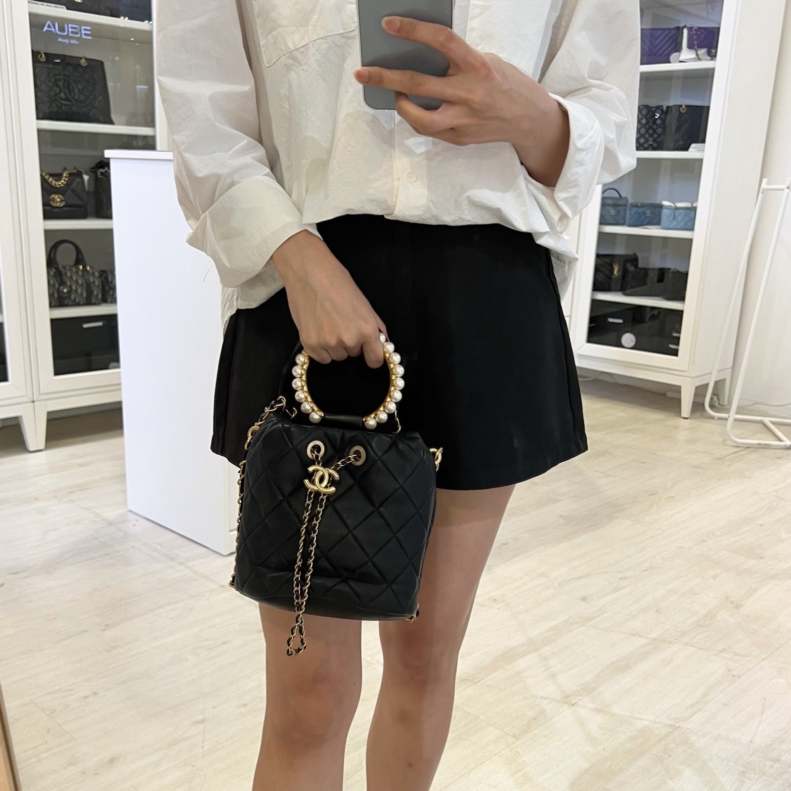 Chanel Pearl Handle Mini Drawstring Bucket Bag in Black Lambskin and Aghw ( )