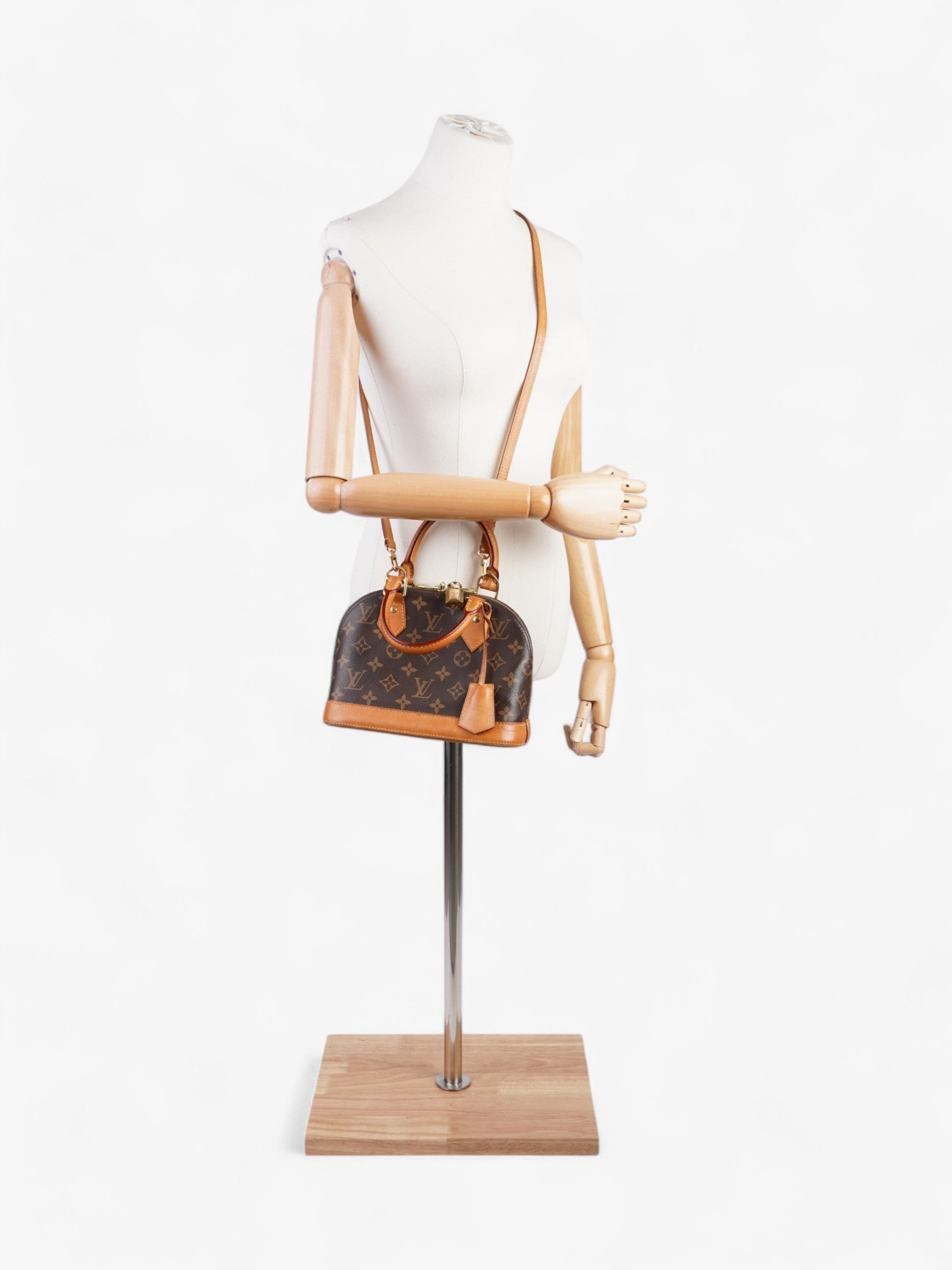 Louis Vuitton Alma Coated BB Monogram Canvas Coated Canvas Apparel