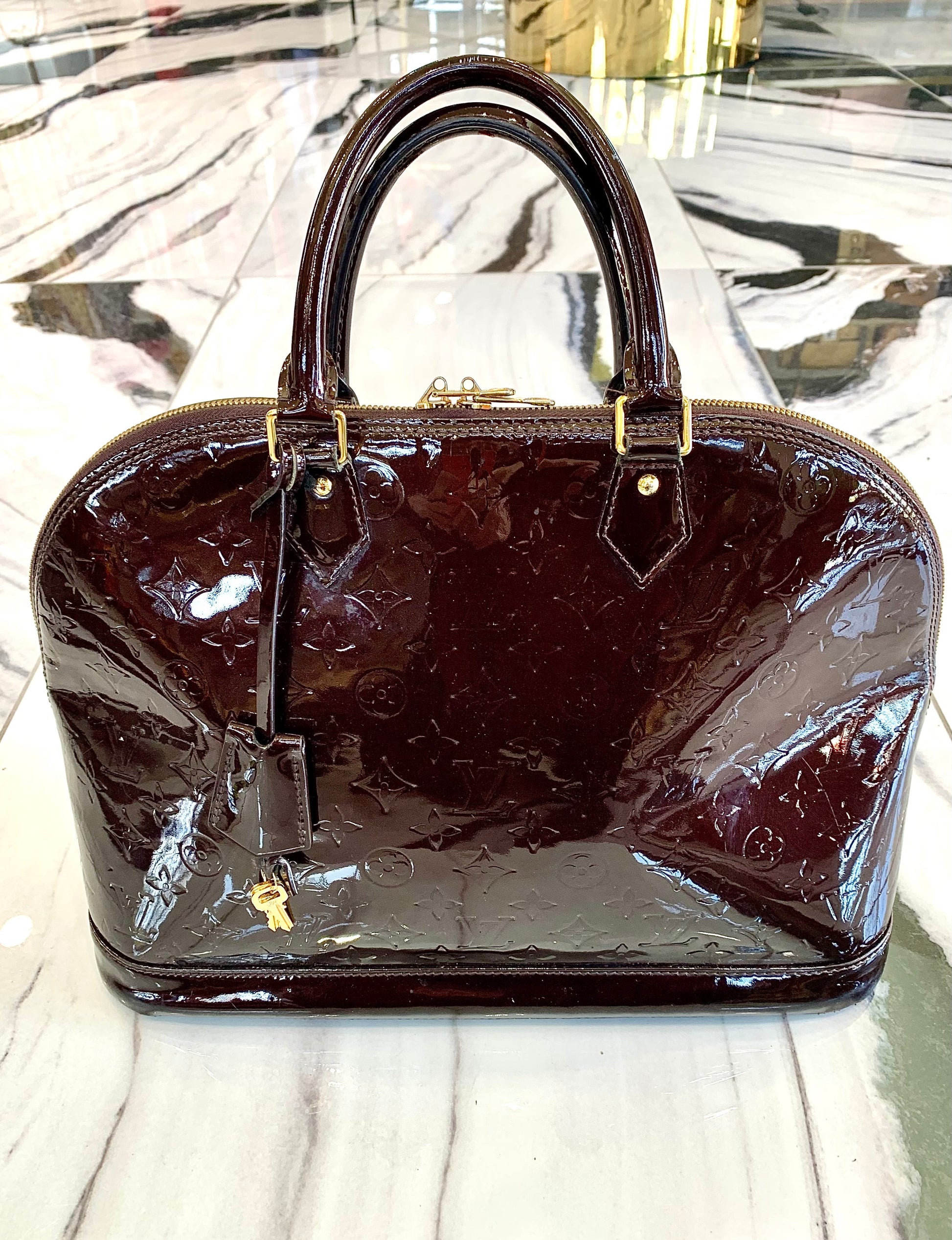Louis Vuitton ALMA AMARANTE GM Vernis Handbag