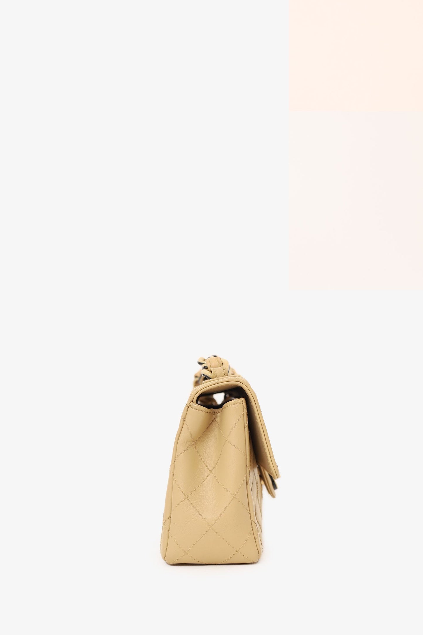 Chanel™ - Cream Quilted Lambskin Mini Flap Bag