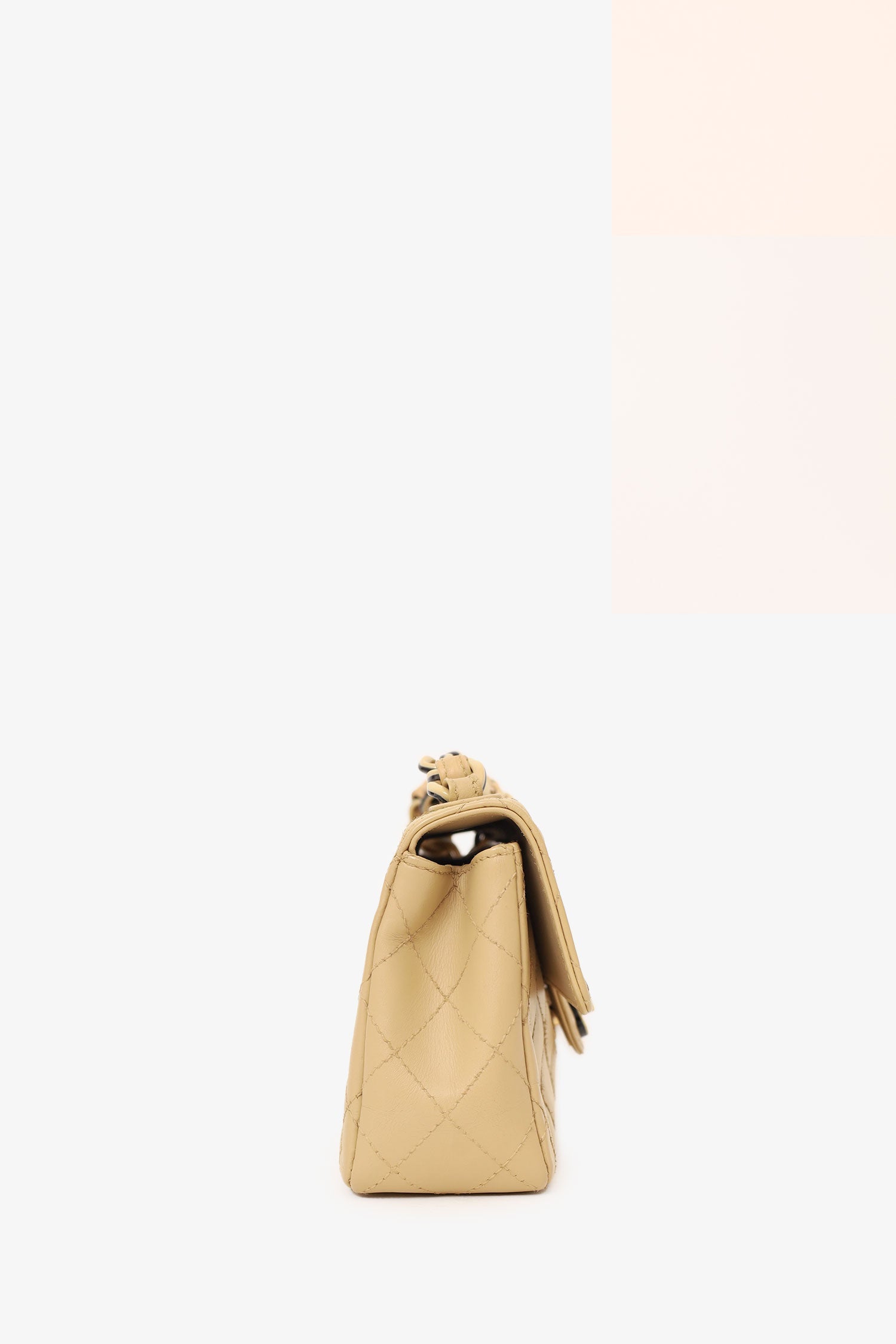 Chanel™ - Cream Quilted Lambskin Mini Flap Bag