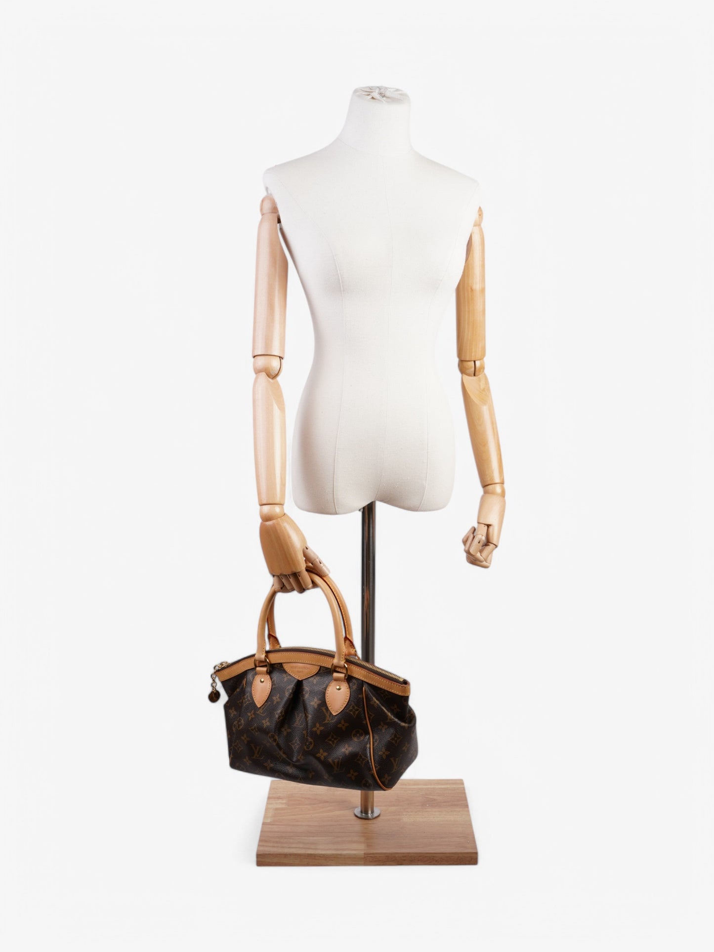 Louis Vuitton Tivoli Coated Monogram Canvas Coated Canvas Apparel