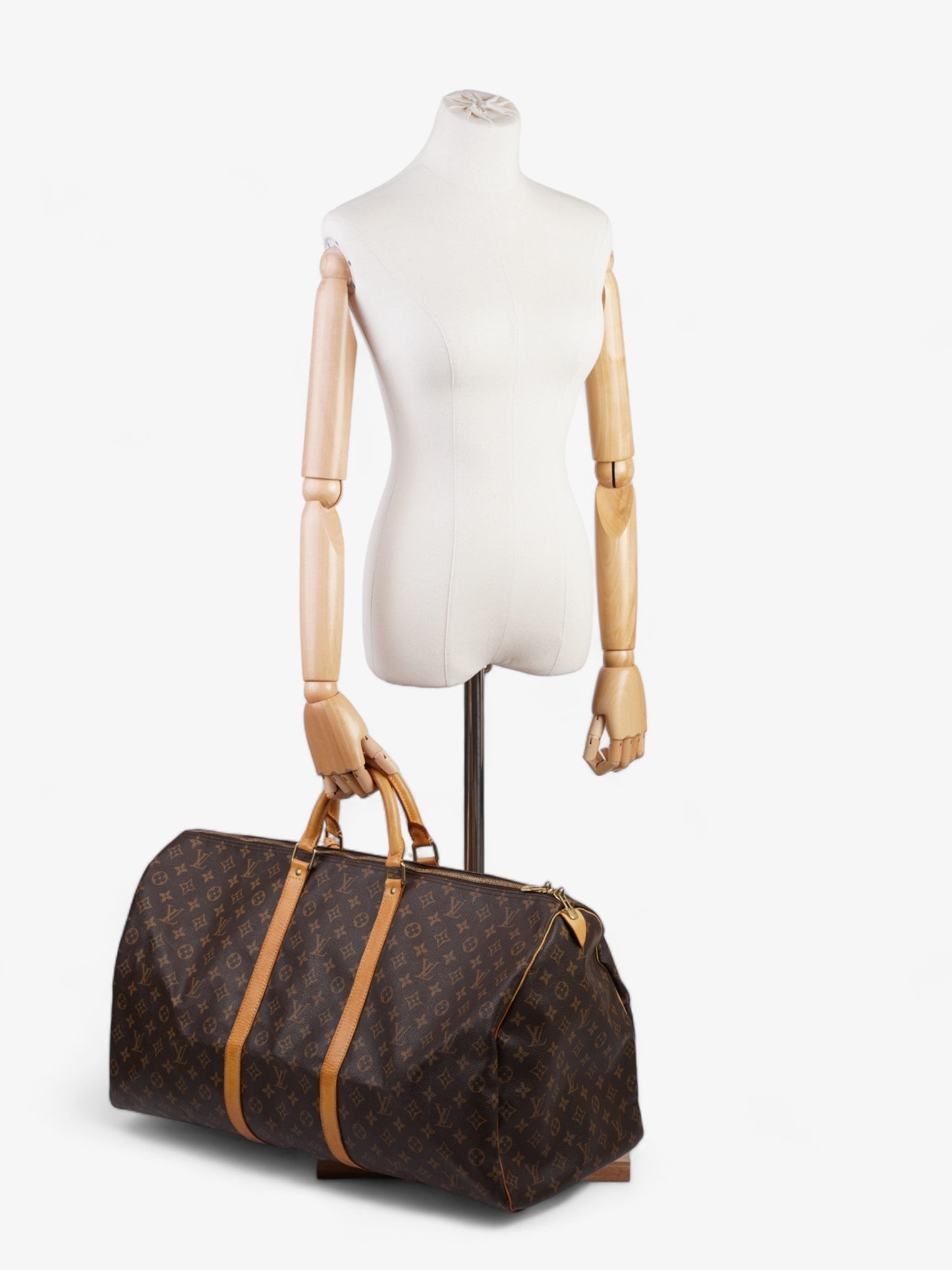 Louis Vuitton Keepall 60 Coated Monogram Canvas Coated Canvas Apparel