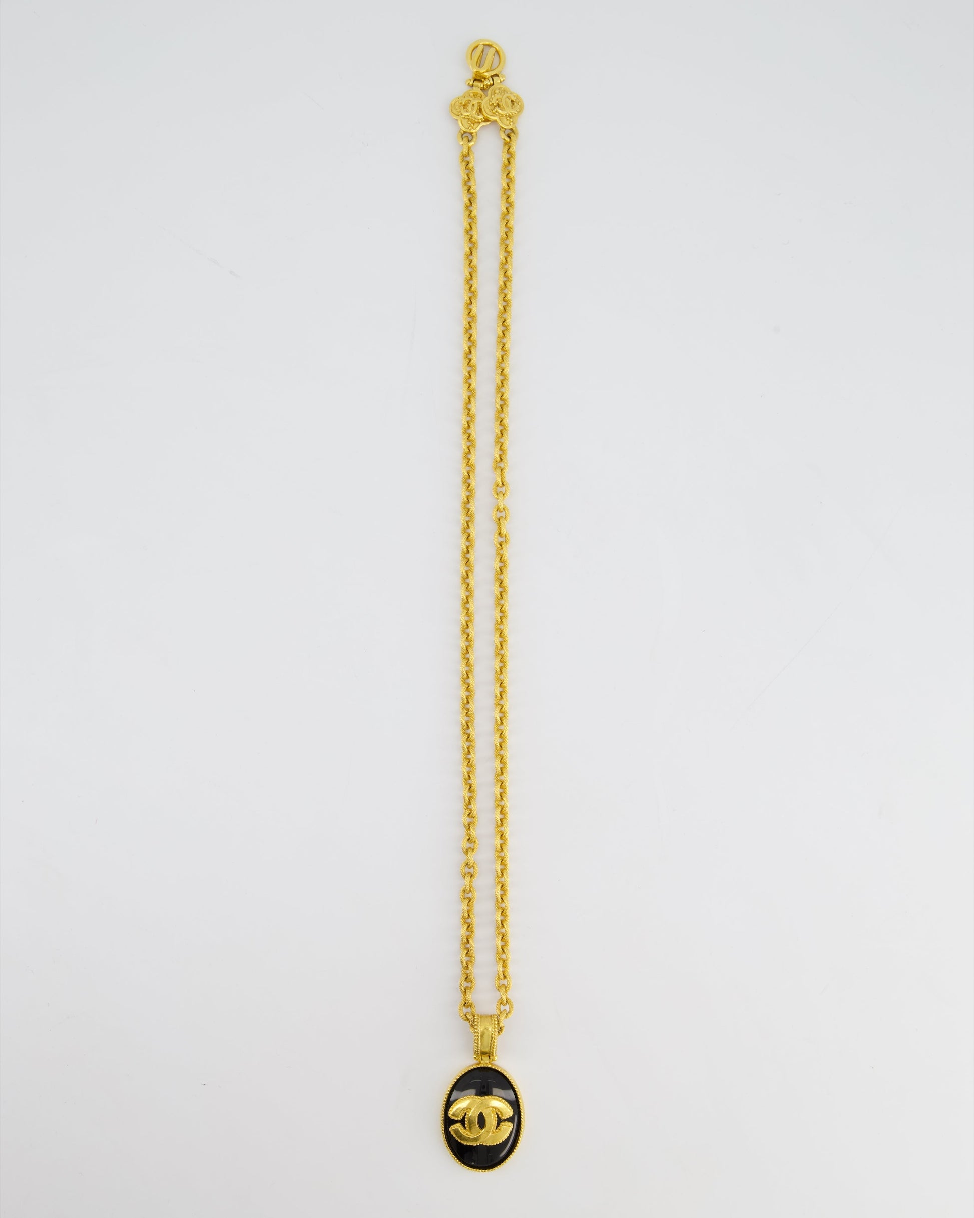 Chanel 96A   Gold and Black Pendant Necklace With CC Detail