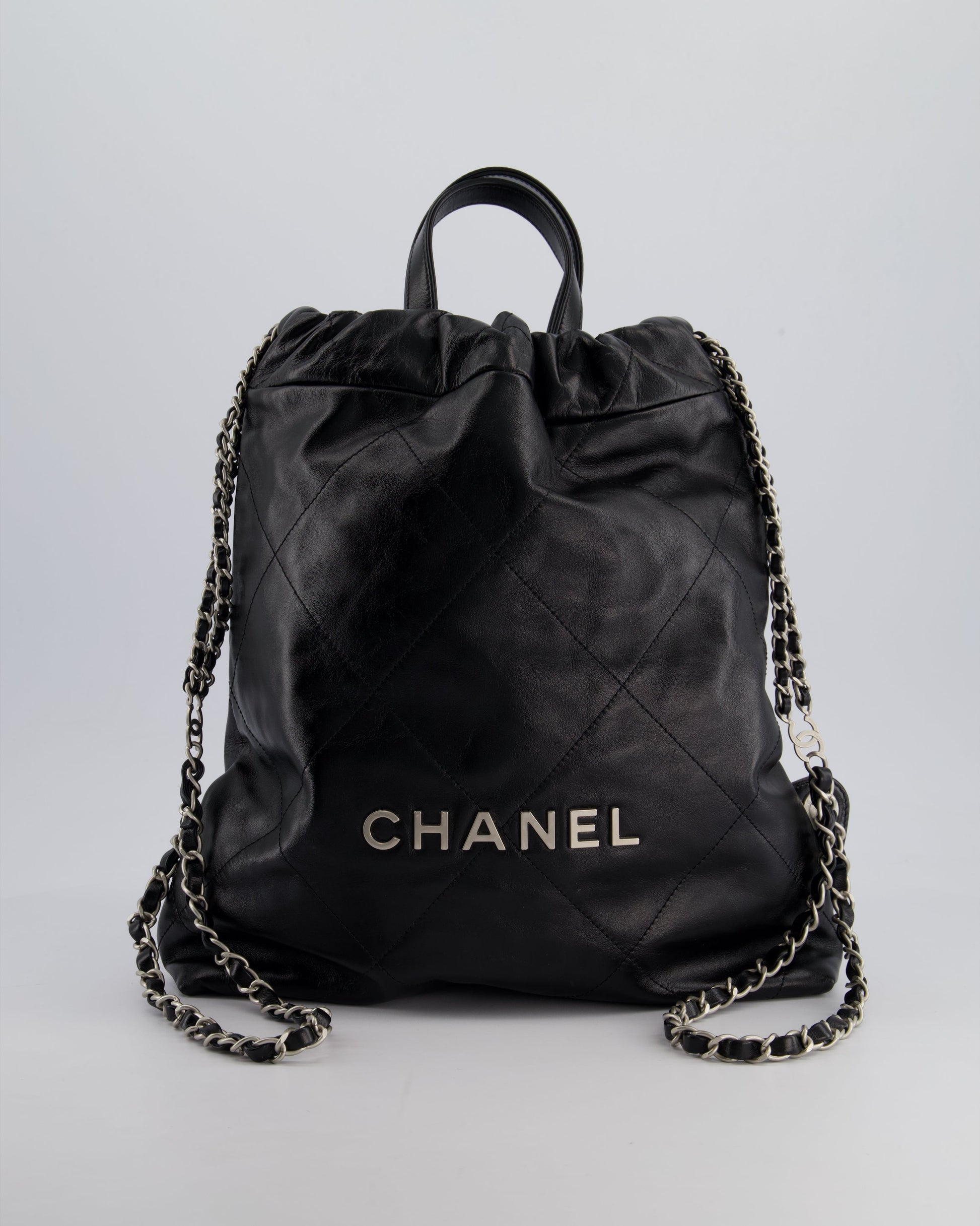 Chanel *Fire Price* 22 Small Backpack Bag In Black Shiny Calfskin With Brushed Silver Hardware