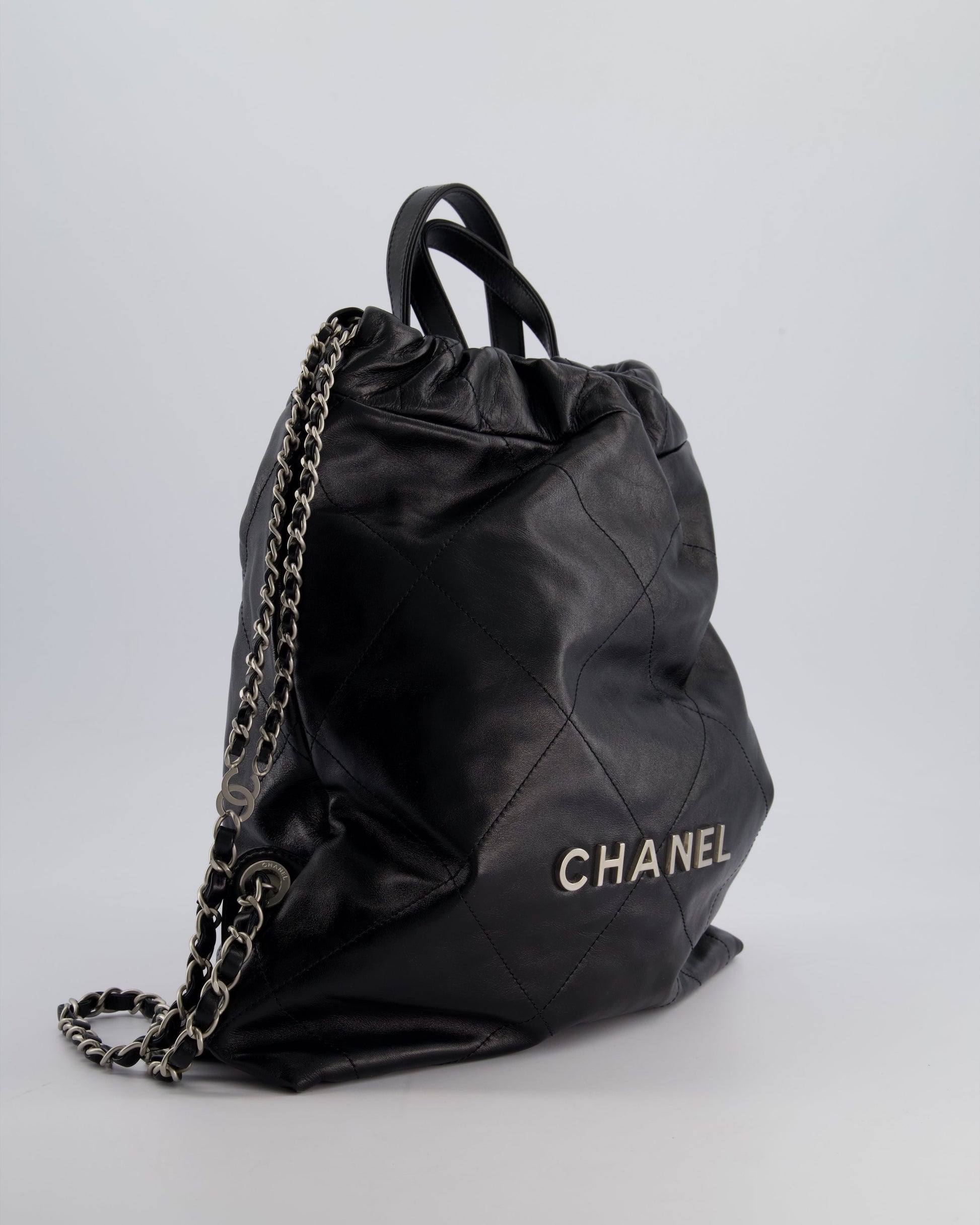Chanel *Fire Price* 22 Small Backpack Bag In Black Shiny Calfskin With Brushed Silver Hardware