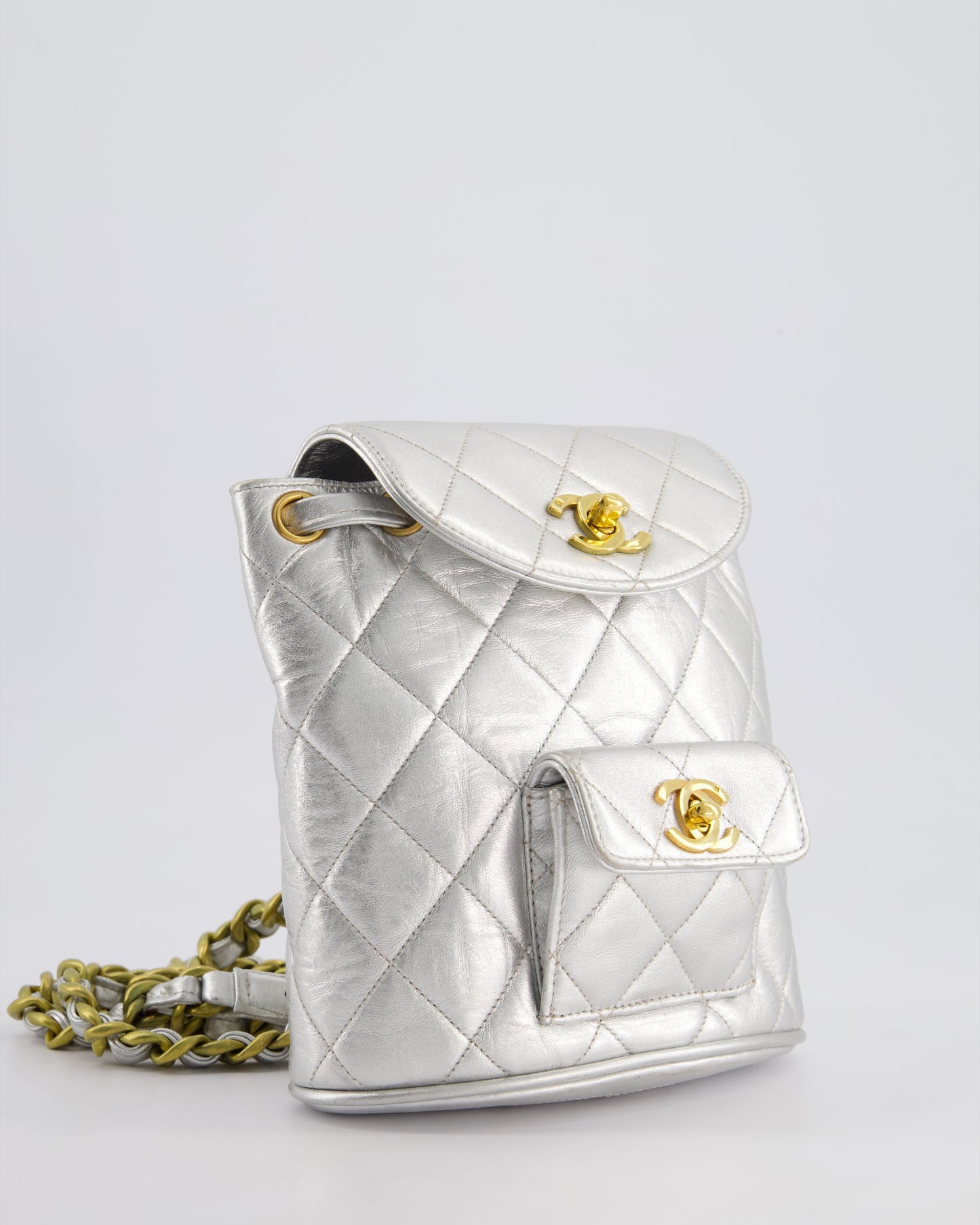 *RARE* Chanel Metallic Silver   Mini Duma Backpack Bag in Lambskin Leather with 24K Gold Hardware