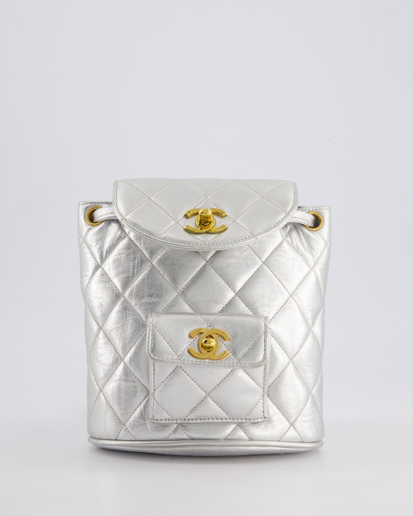 Chanel *Rare* Metallic Silver Mini Duma Backpack Bag In Lambskin Leather With 24K Gold Hardware