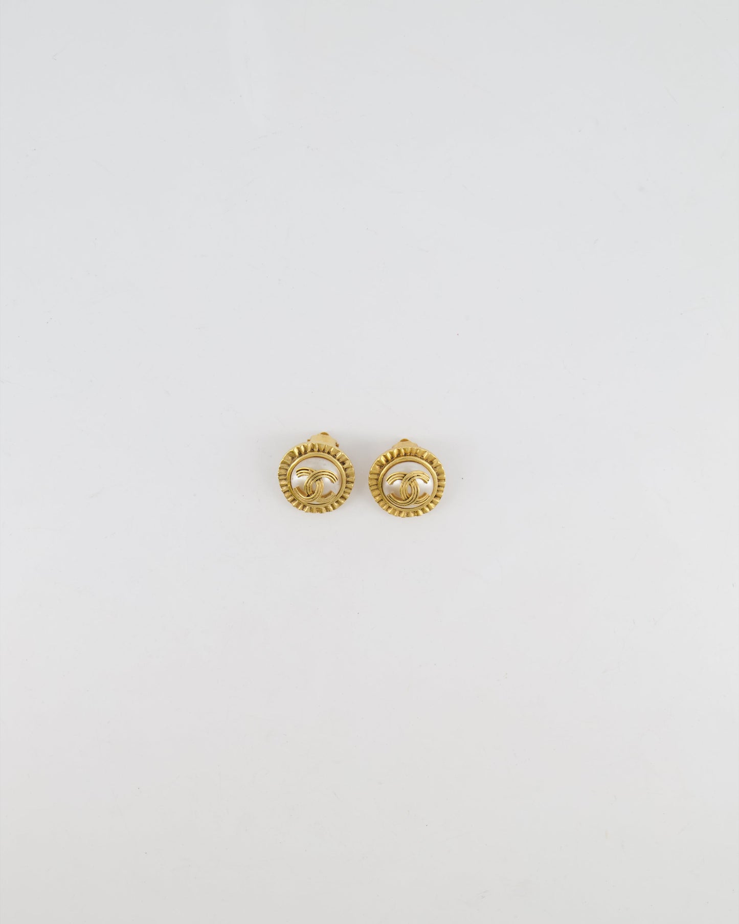 Chanel   94A Mother of Pearl and Gold Clip on Earrings with Rouched Border Detail and CC Logo