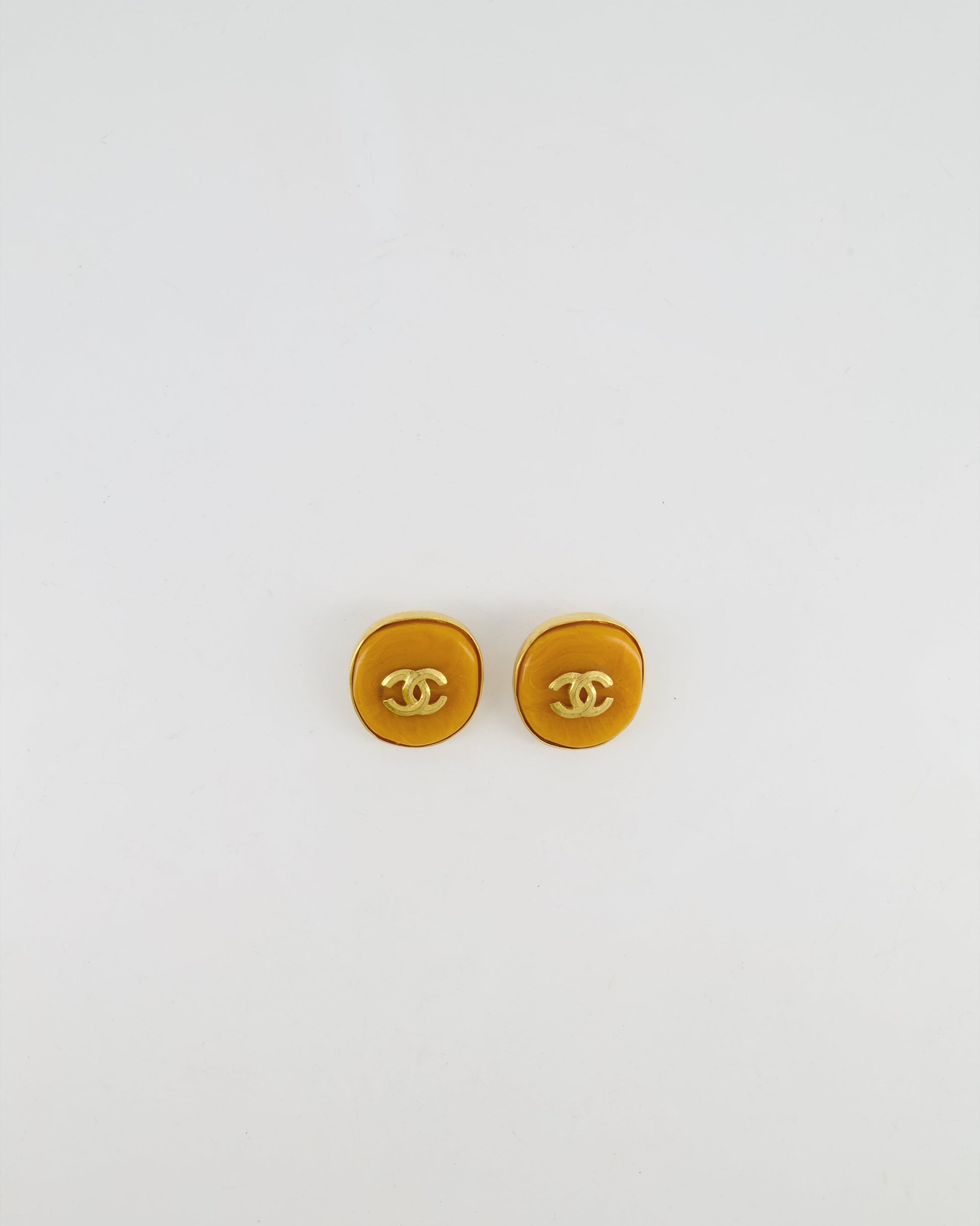 Chanel 98P Orange Rounded Clip on Earrings with Gold Rim and CC Logo Detail