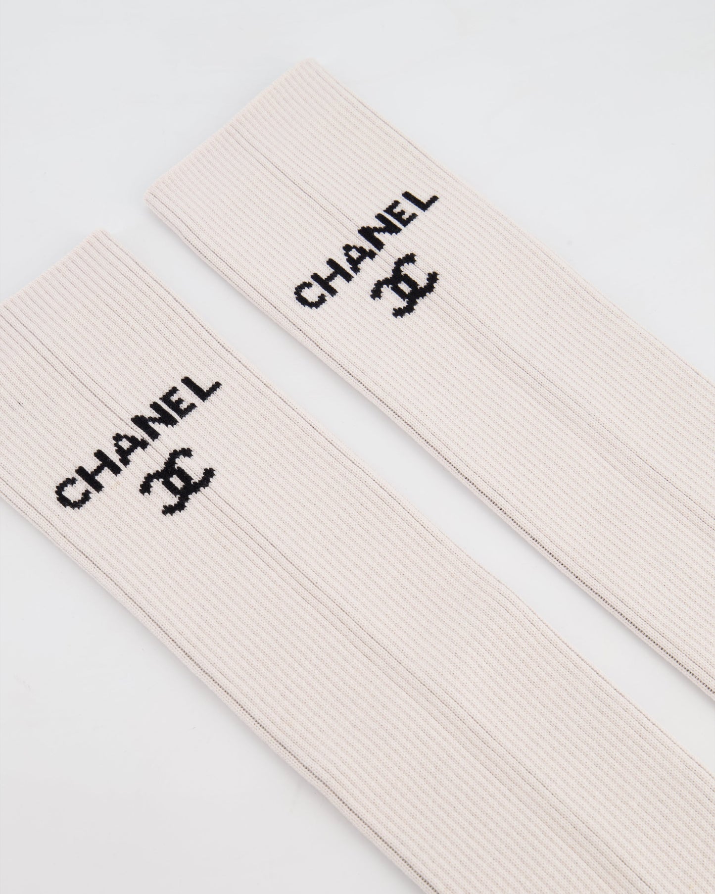 Chanel Light Pink Knit Leg Warmers With Black Logo Bag