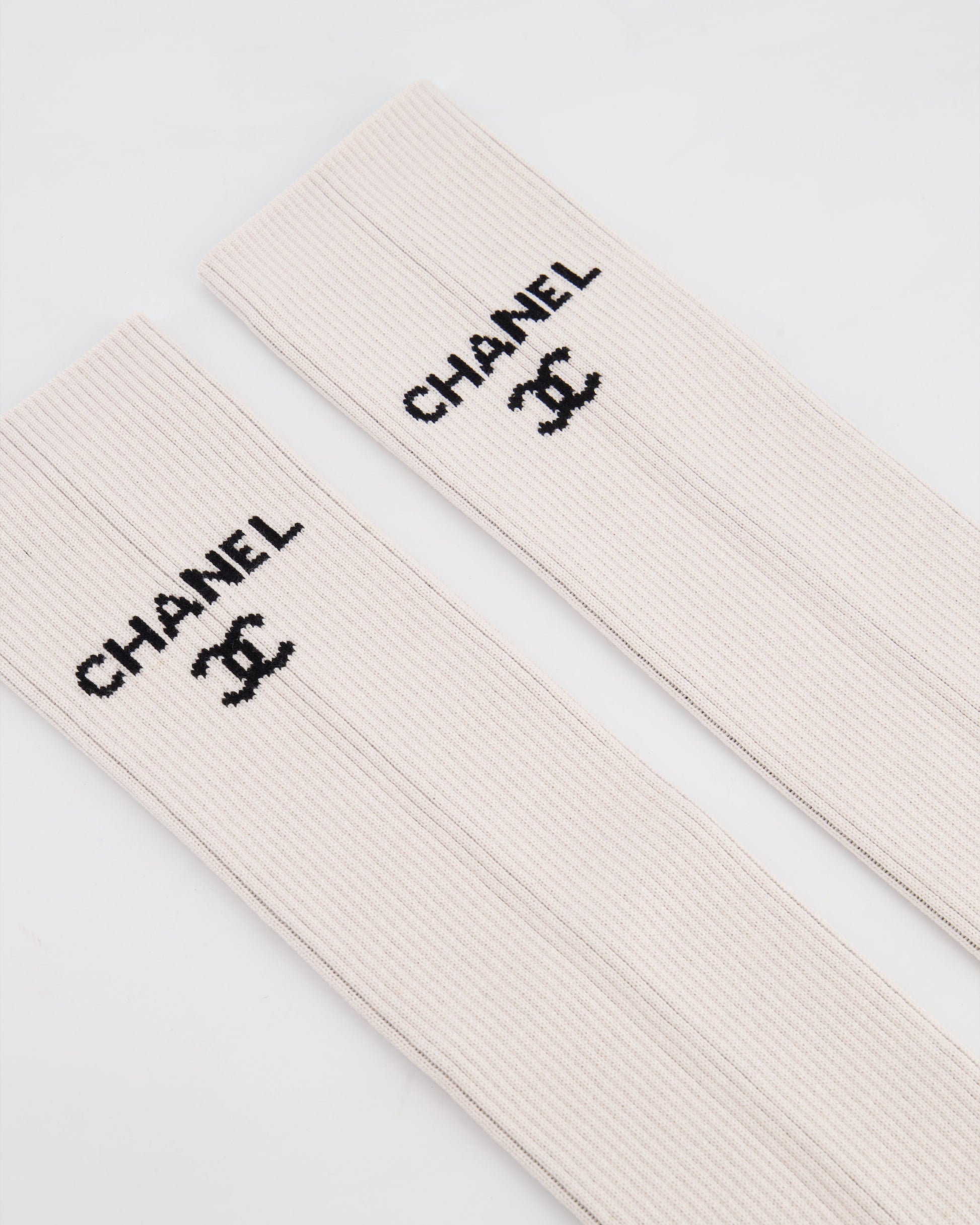 Chanel Light Pink Knit Leg Warmers With Black Logo Bag