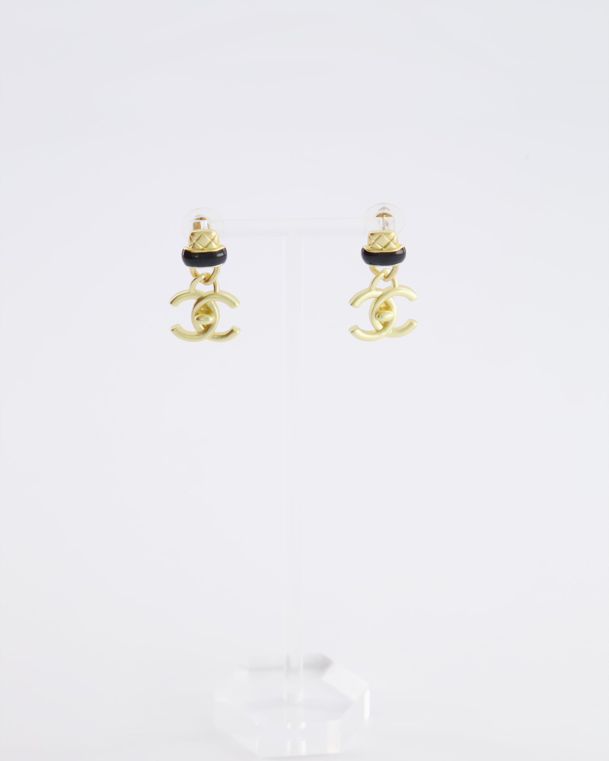 Chanel 22A Brushed Gold CC Logo Pendant Earrings with Black Enamel Detailing