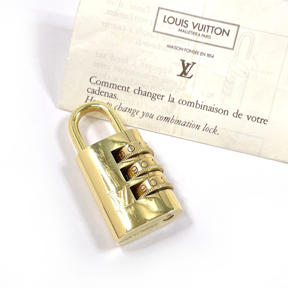 Louis Vuitton Cadena brass padlock Dial padlock Gold Handbag