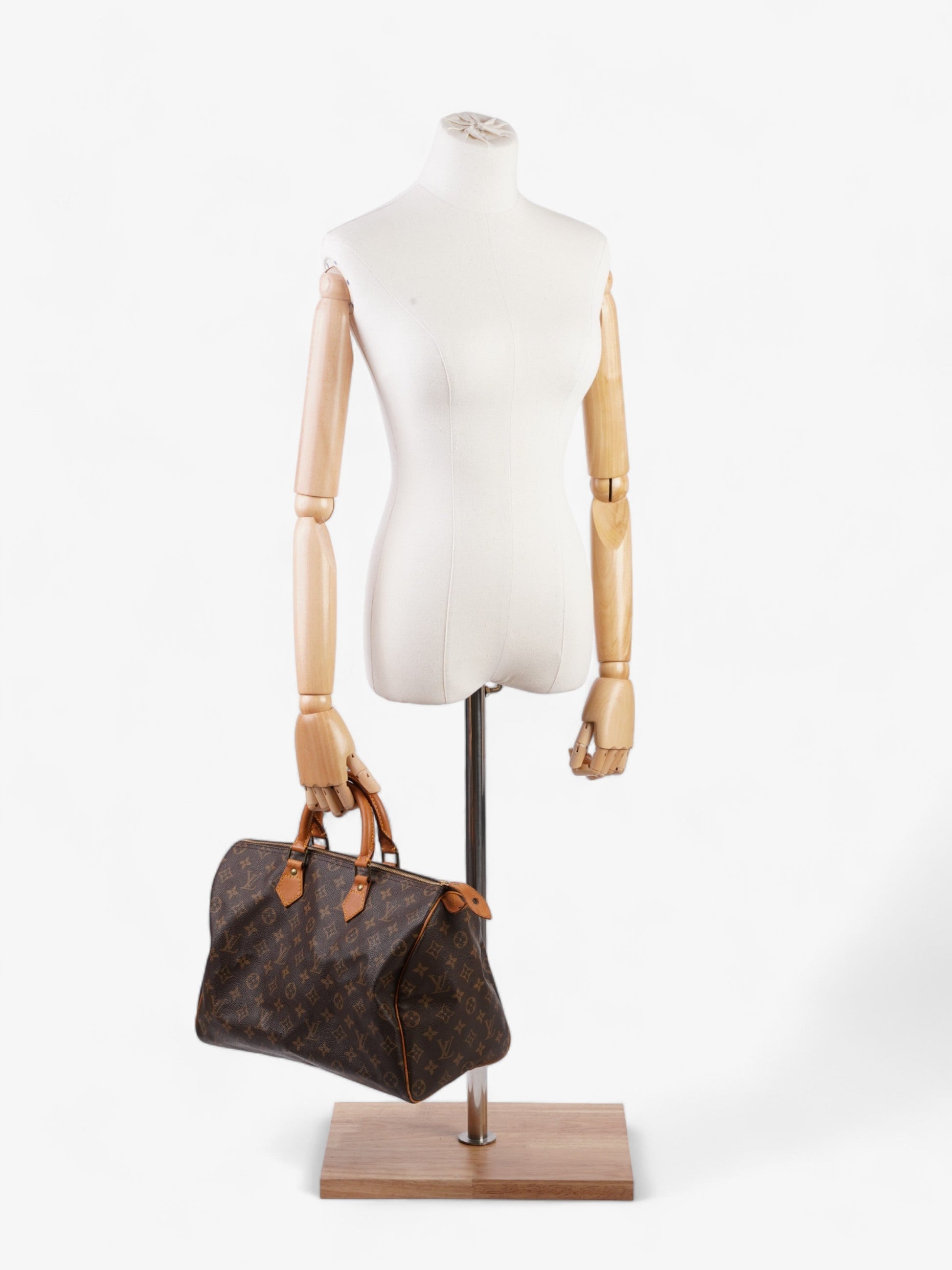 Louis Vuitton Speedy Coated 35 Monogram Canvas Coated Canvas Apparel Canvas 35