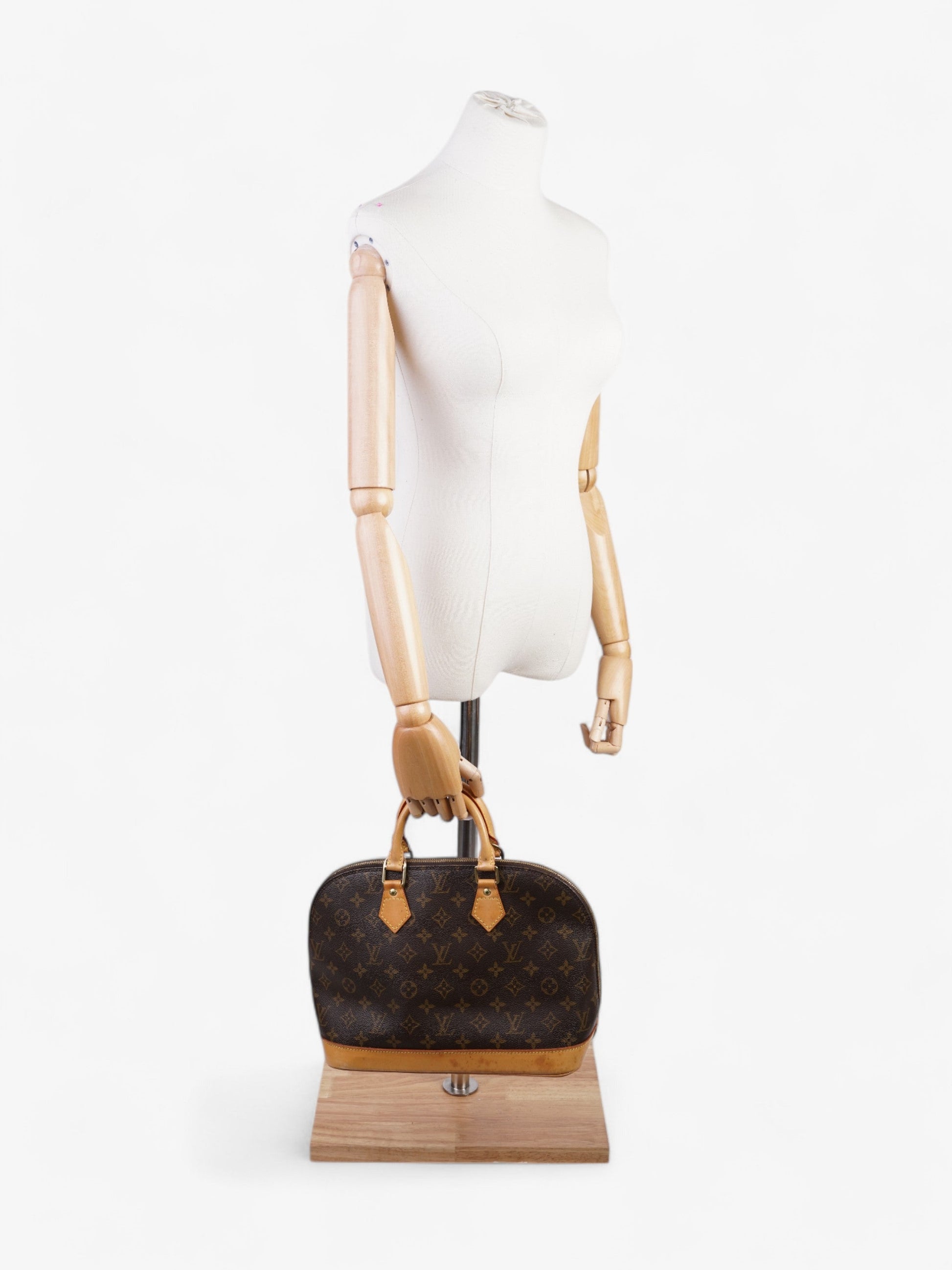 Louis Vuitton Alma Coated PM Monogram Canvas Coated Canvas Apparel