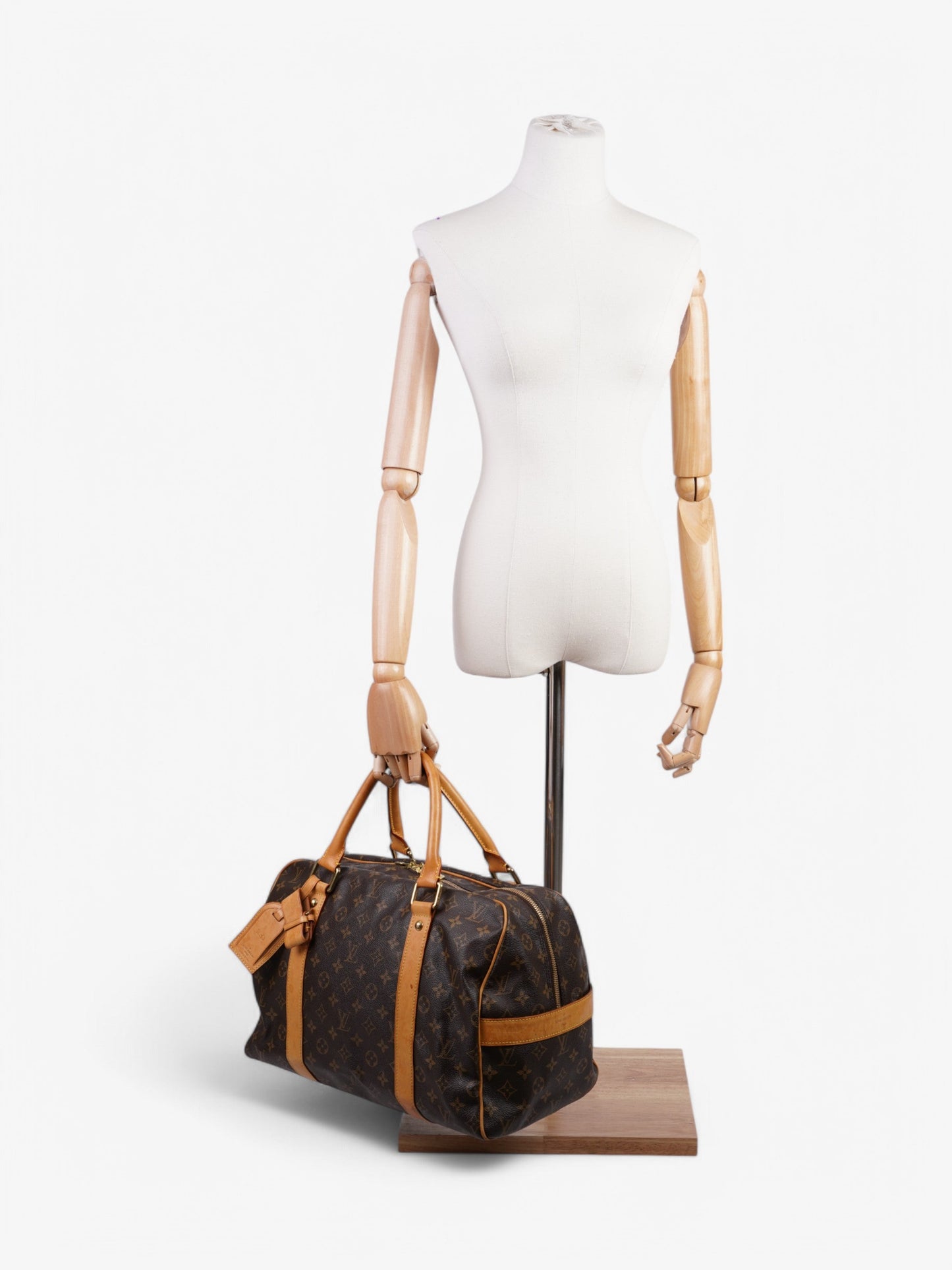 Louis Vuitton Carry All Coated Monogram Canvas Coated Canvas Apparel
