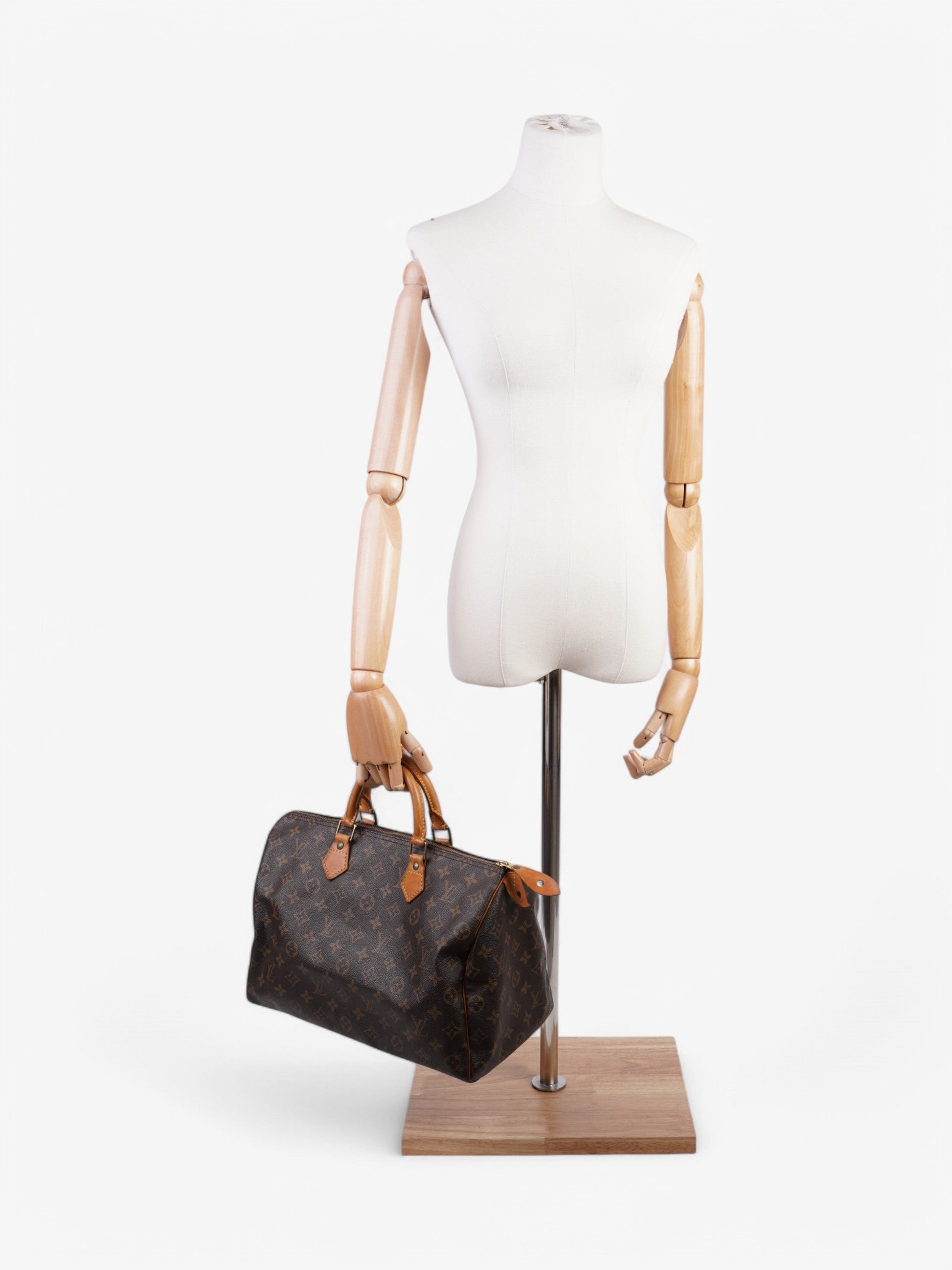 Louis Vuitton Speedy Coated 35 Monogram Canvas Coated Canvas Apparel Canvas 228