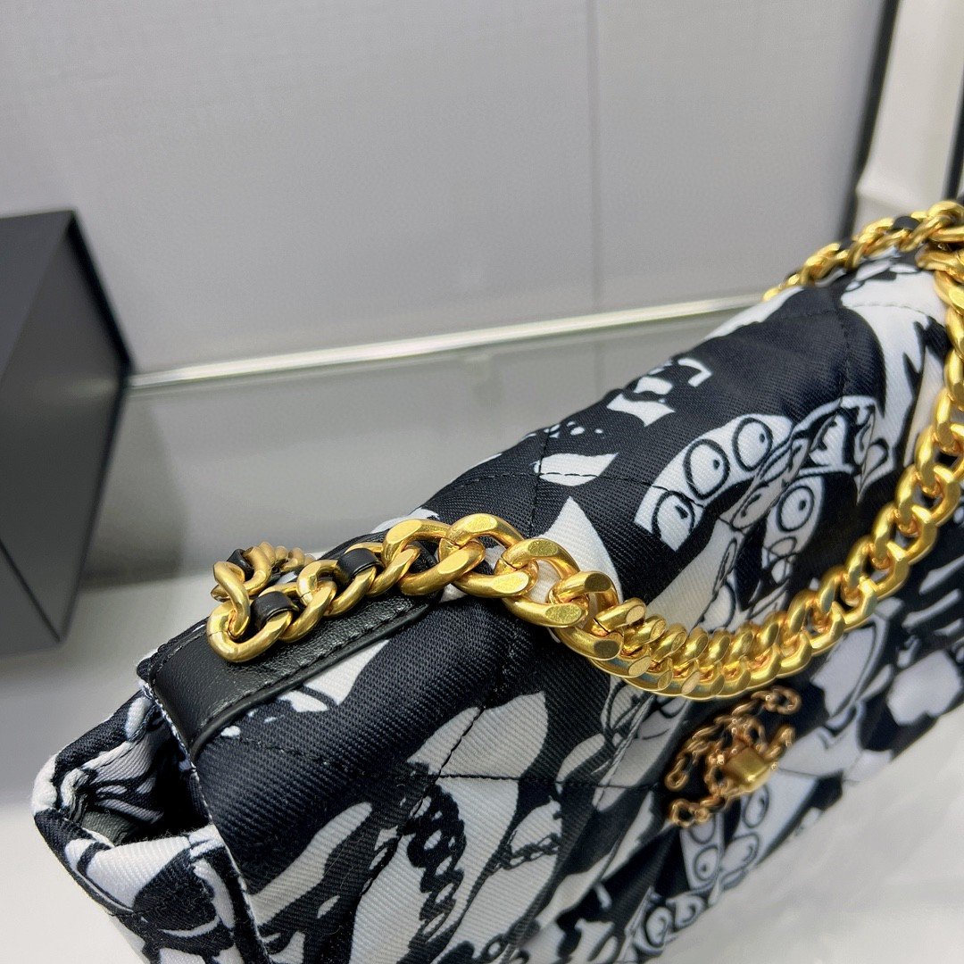 Chanel Printed Canvas Black White Travel Bag
