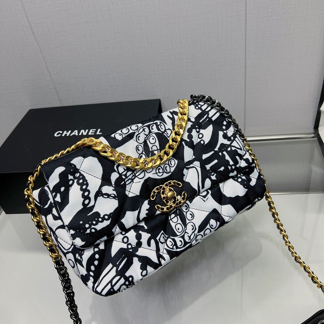 Chanel Printed Canvas Black White Travel Bag