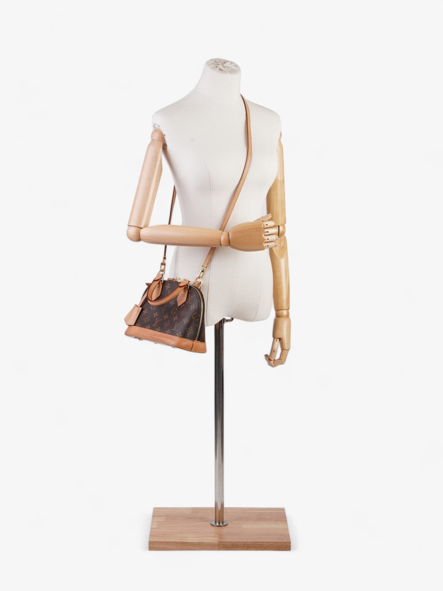 Louis Vuitton Alma BB Coated Monogram Canvas Coated Canvas Apparel