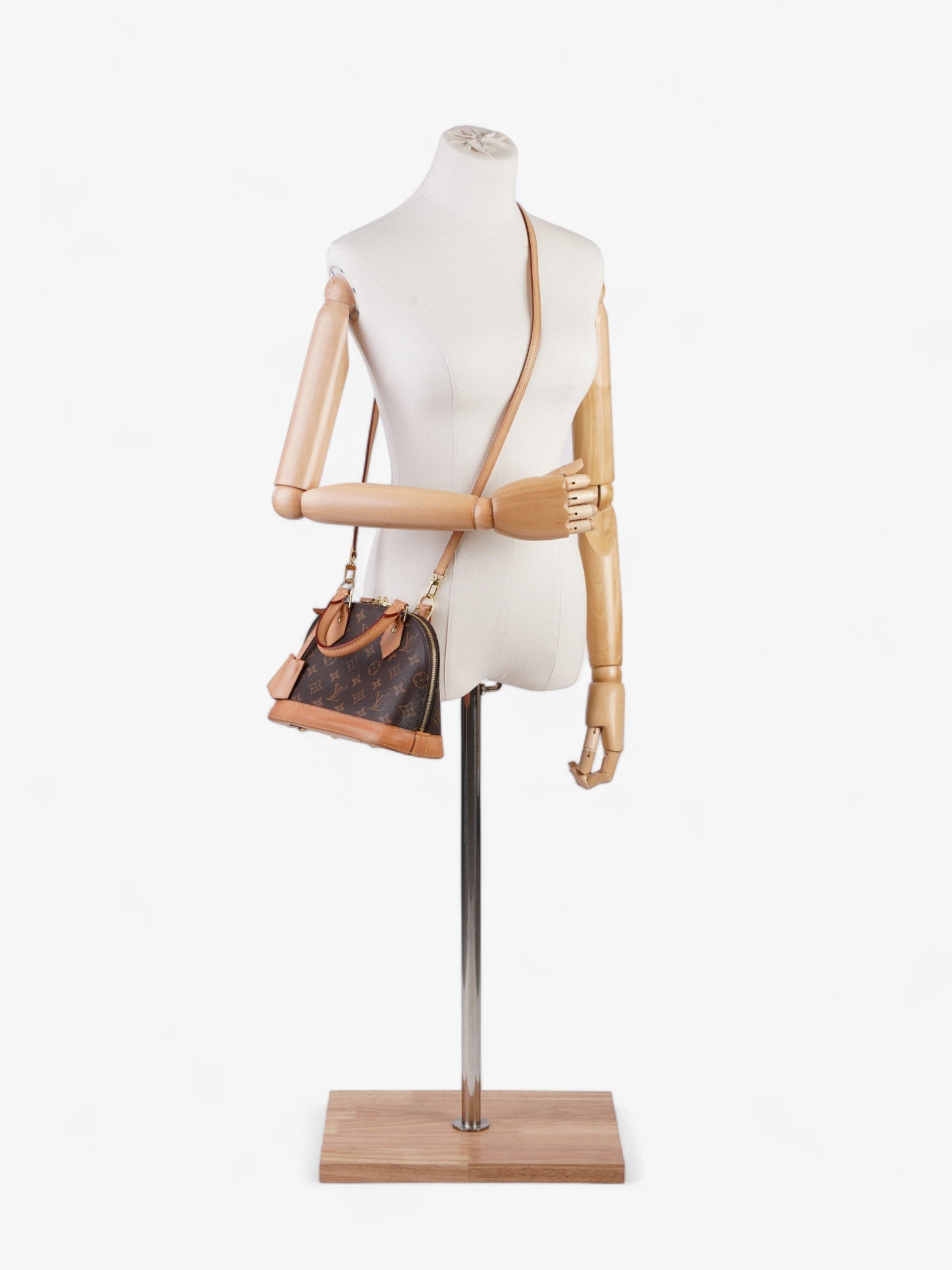 Louis Vuitton Alma BB Coated Monogram Canvas Coated Canvas Apparel