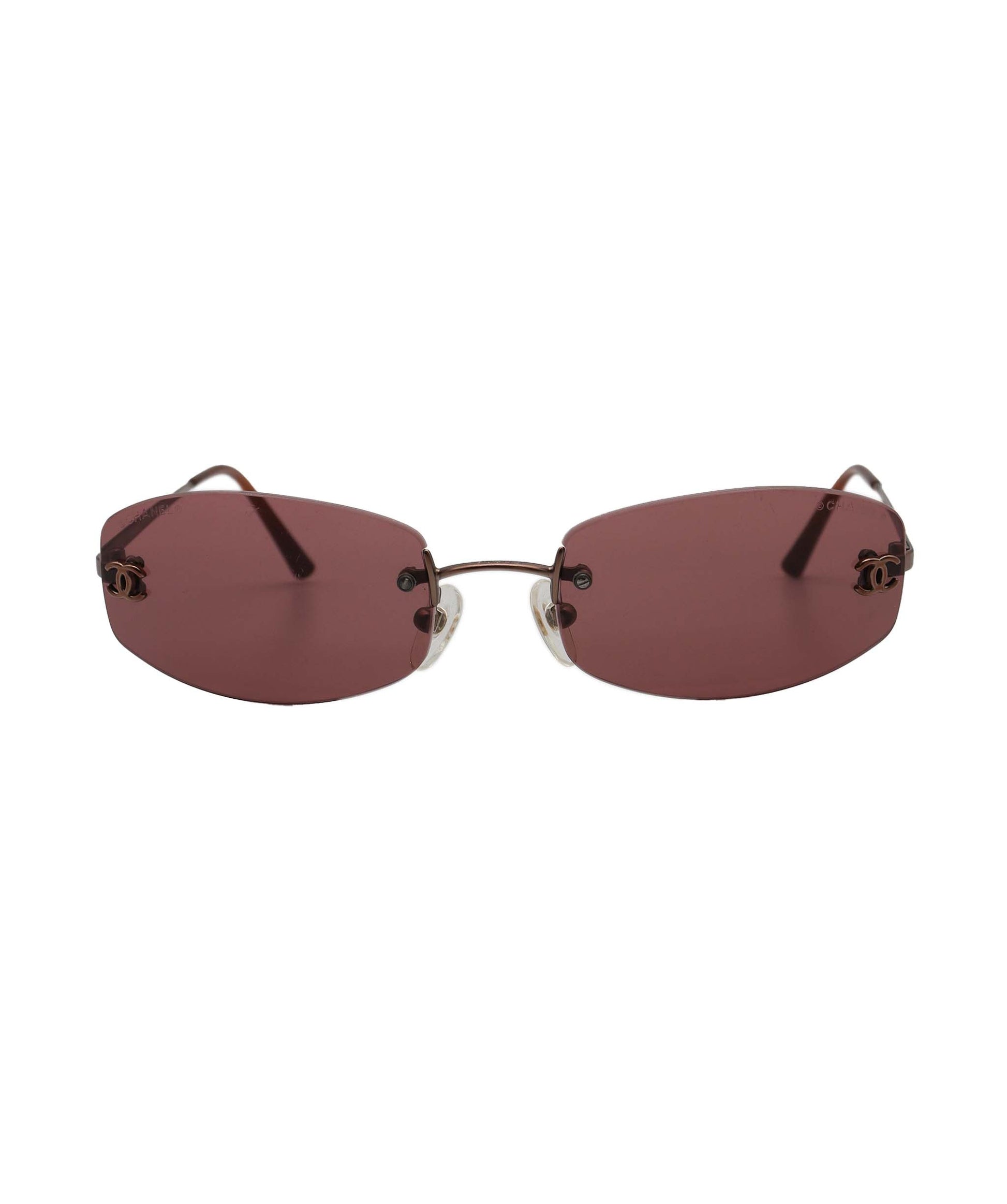 **with caroline stanbury**Chanel Dark Brown Rimless CC Aviators DXBS0932