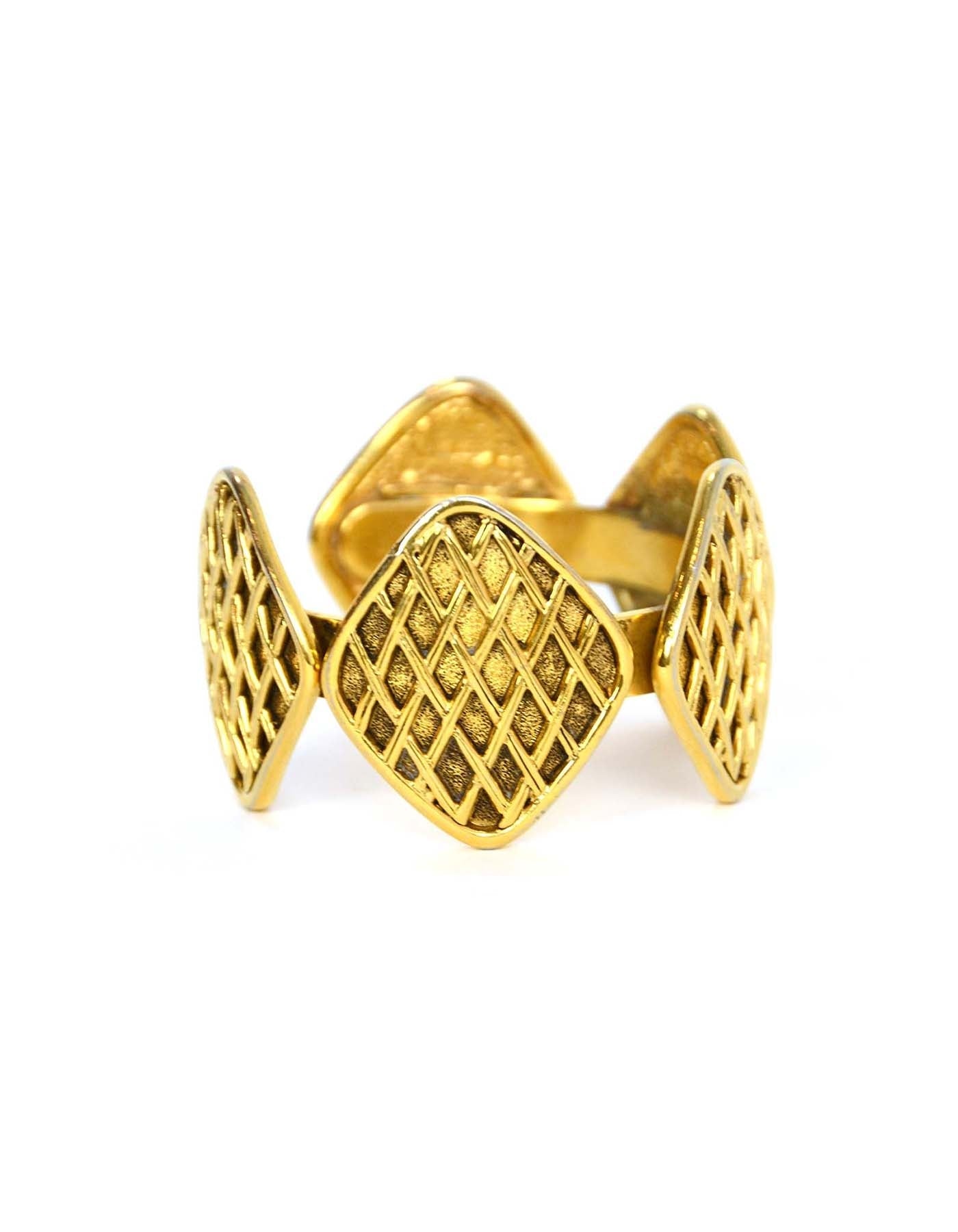Chanel   '90s Gold Quilted Medallion Cuff Bracelet