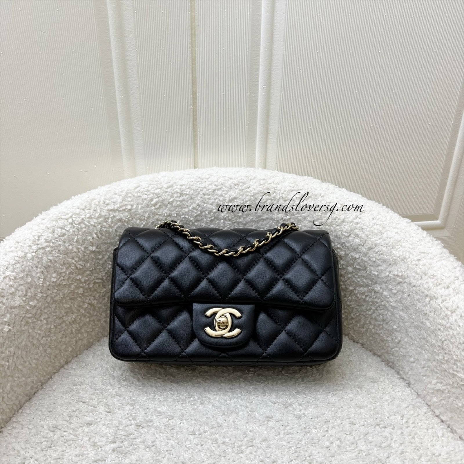 Chanel 24K Extra Mini Rectangular Flap in Black Lambskin and Ghw ( ) Handbag