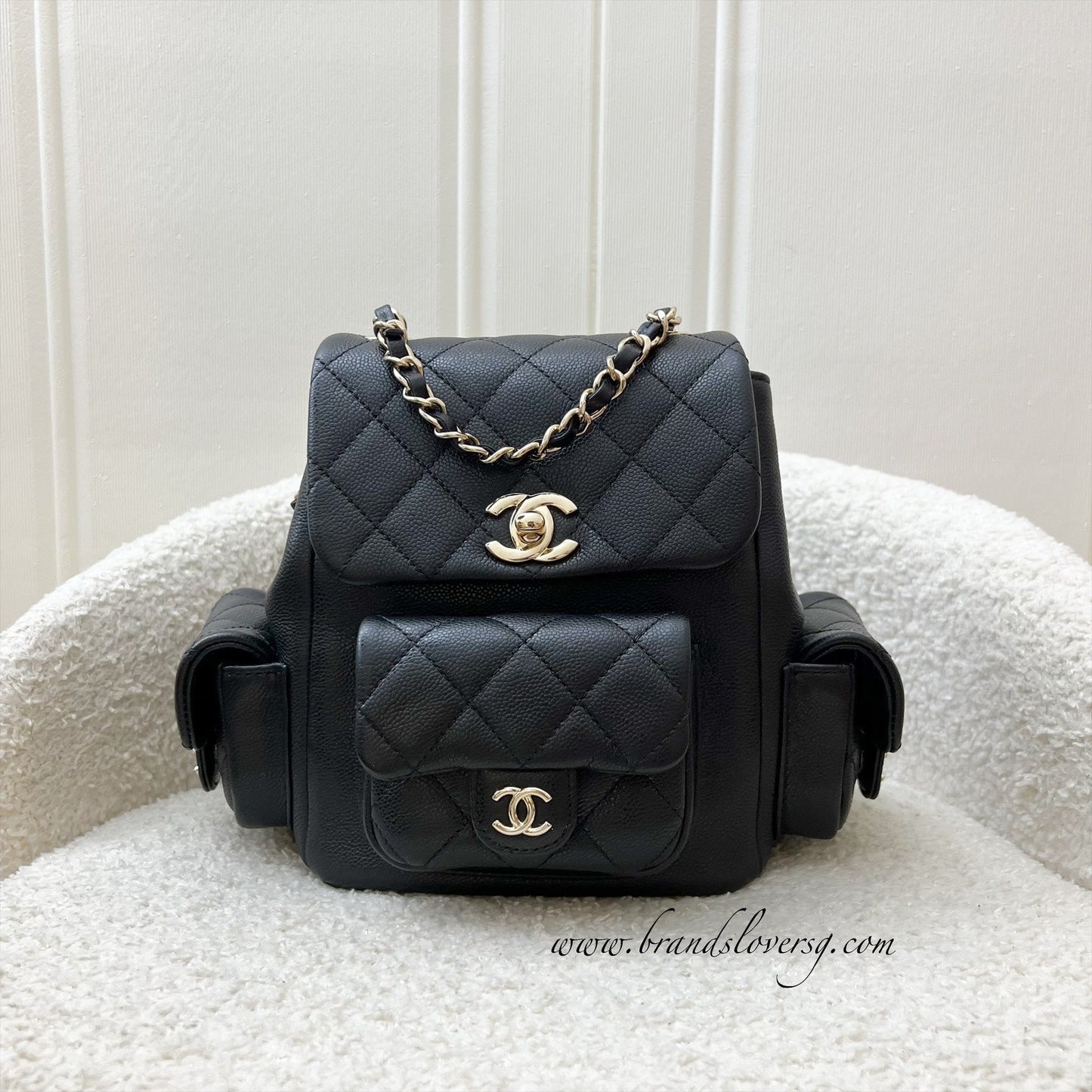Chanel 23K Triple Pocket Duma Backpack In Black Caviar And Lghw (model: AS4399)