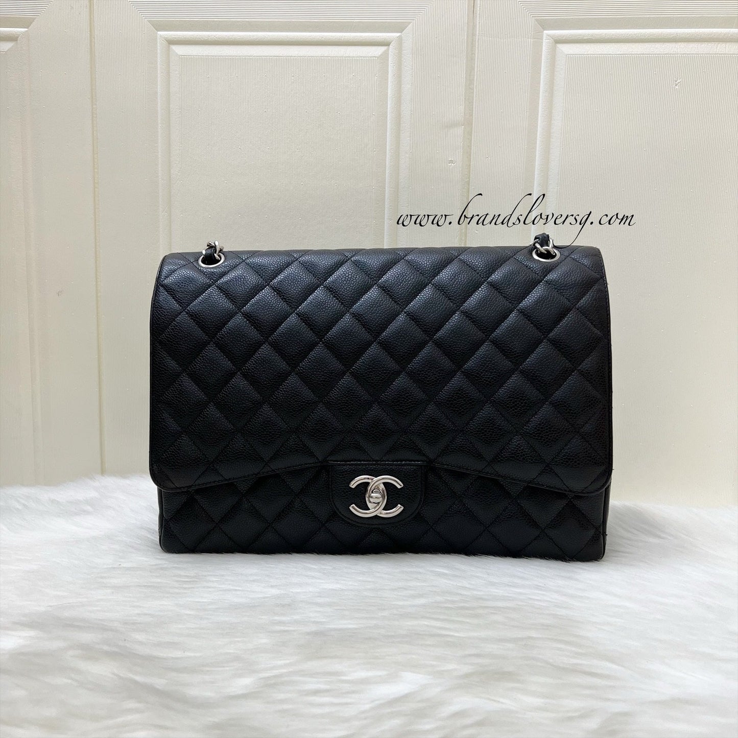 Chanel Maxi Classic Flap Df in Black Caviar and Shw Handbag