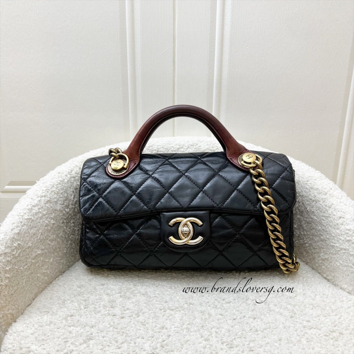 Chanel Castle Rock Flap in Black Glossy Distressed Calfskin and Aghw Handbag