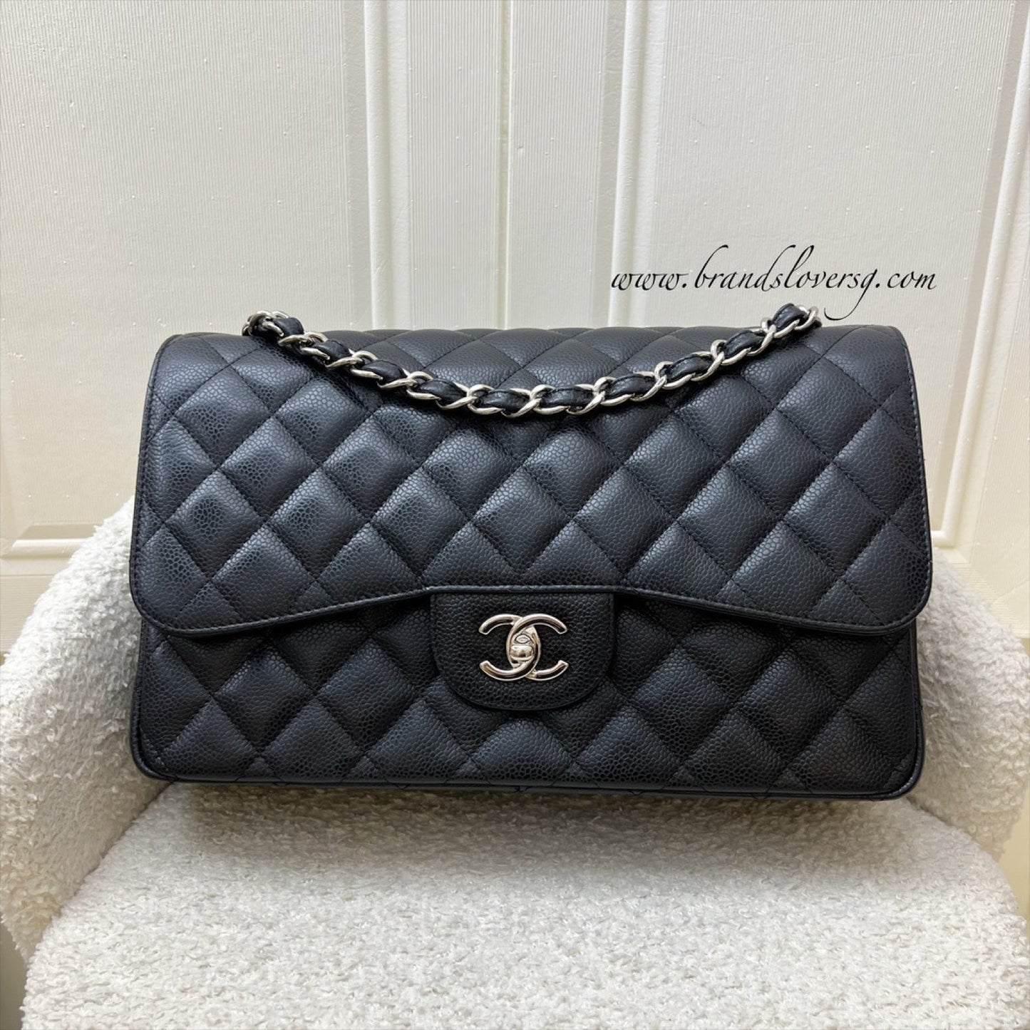 Chanel Jumbo Classic Flap Df in Black Caviar and Shw Handbag