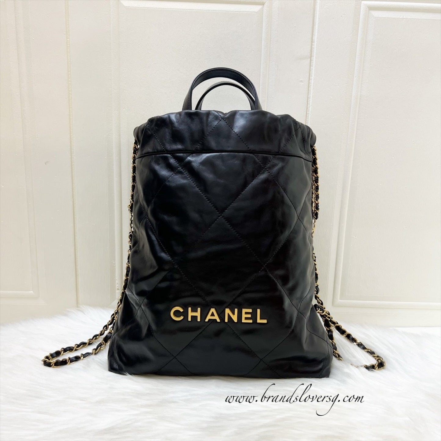 Chanel 22 Small Backpack In Black Shiny Calfskin And Aghw
